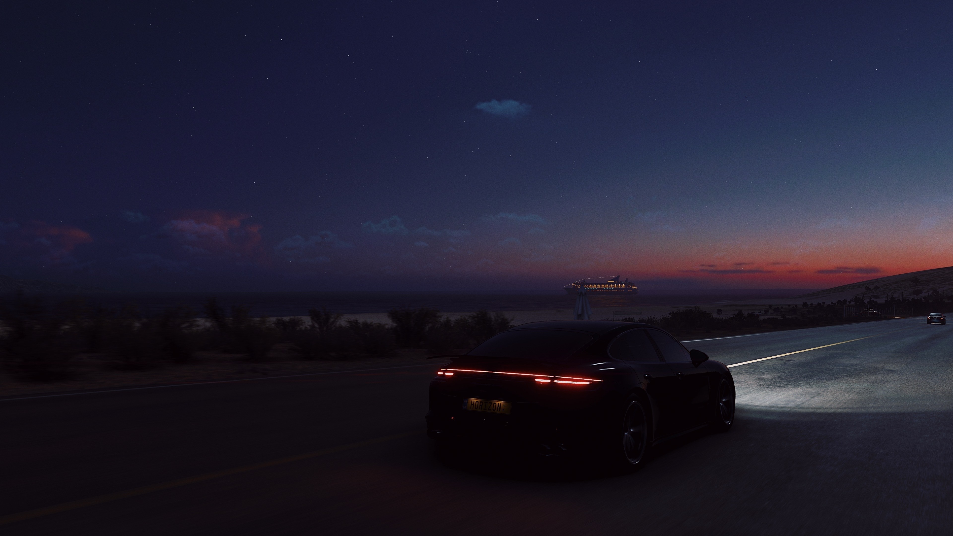 4K Porsche Panamera on a road at dusk HD Wallpaper