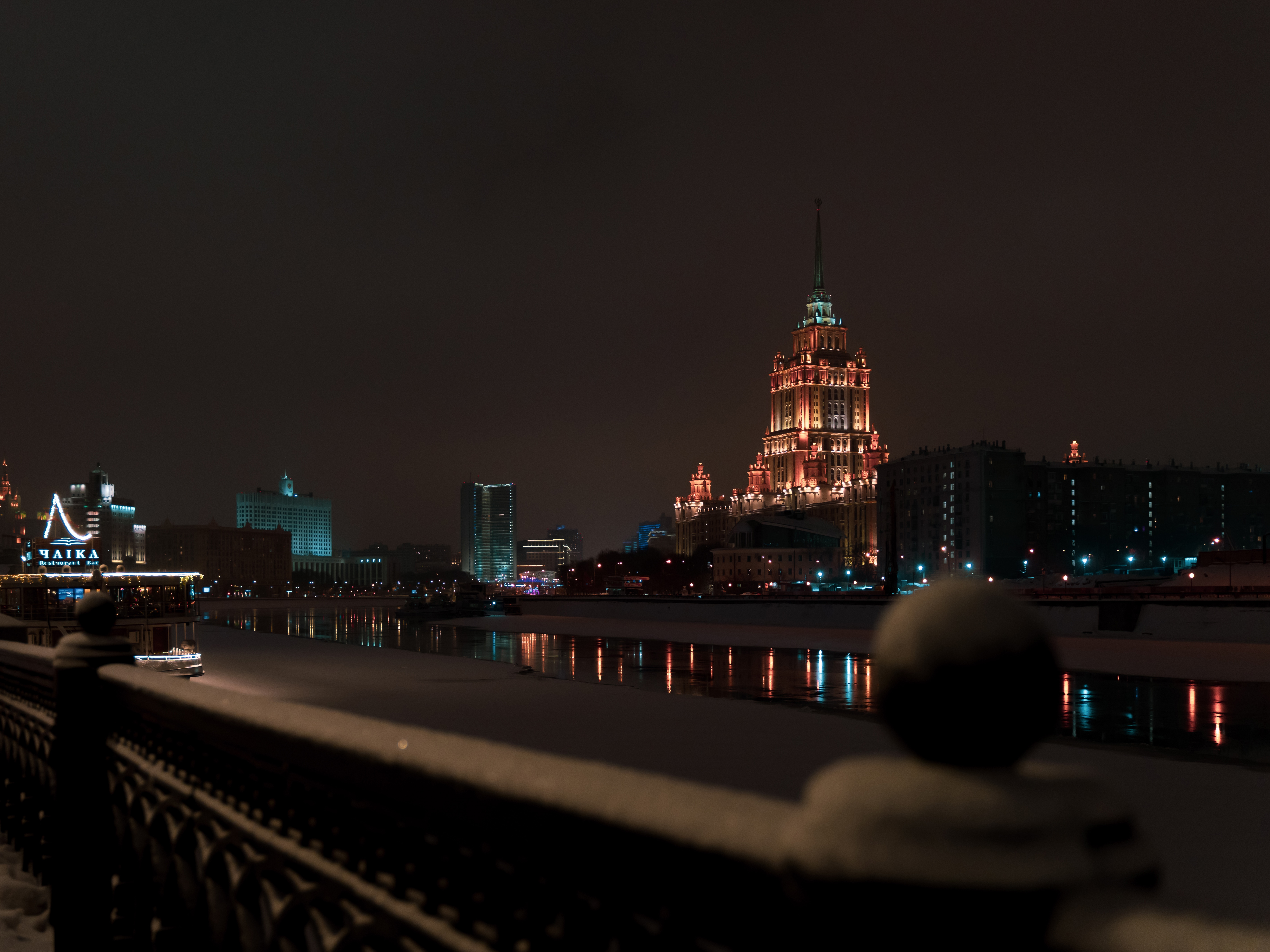 Moscow cityscape at night with illuminated buildings HD Wallpaper