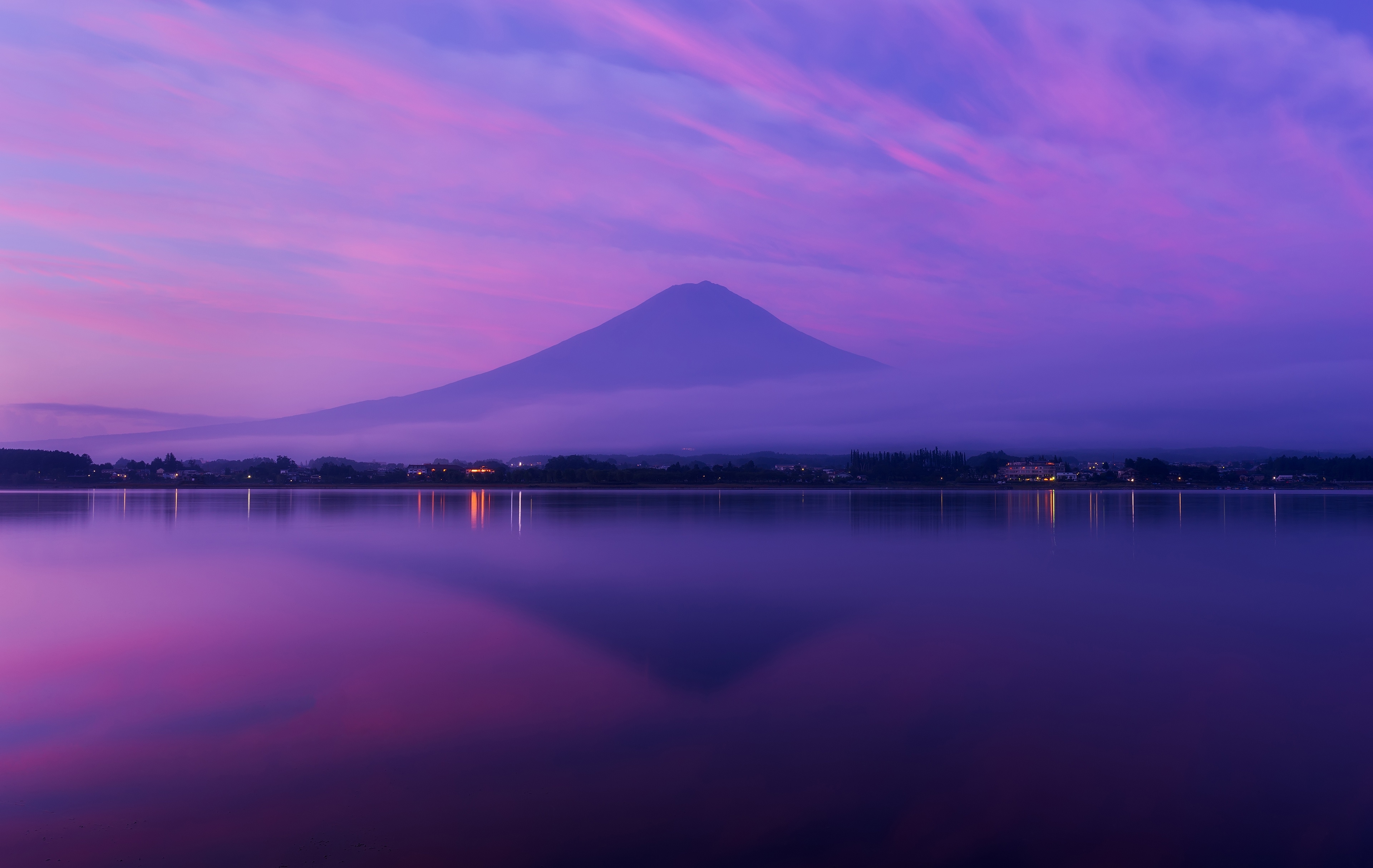 Mount Fuji reflected in a lake at twilight HD Wallpaper