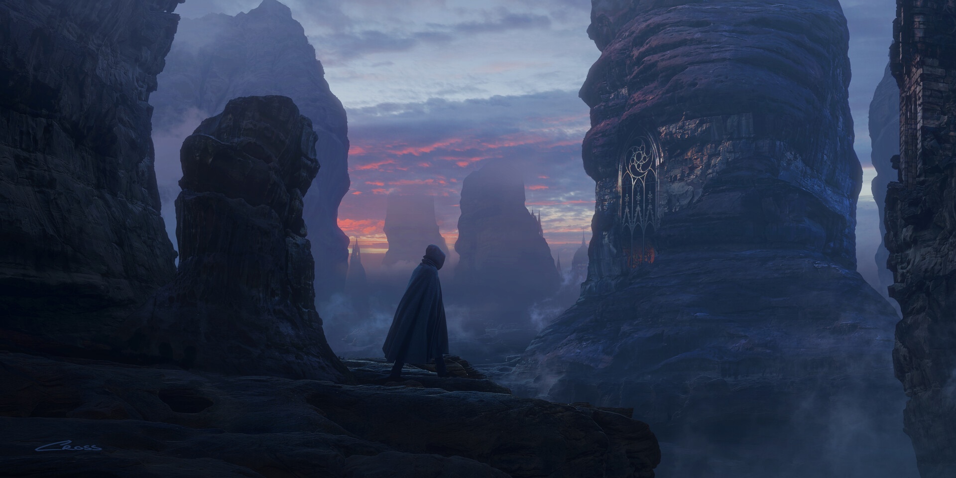 Figure in a cloak stands on a rocky outcrop overlooking a misty valley with rock spires. HD Wallpaper