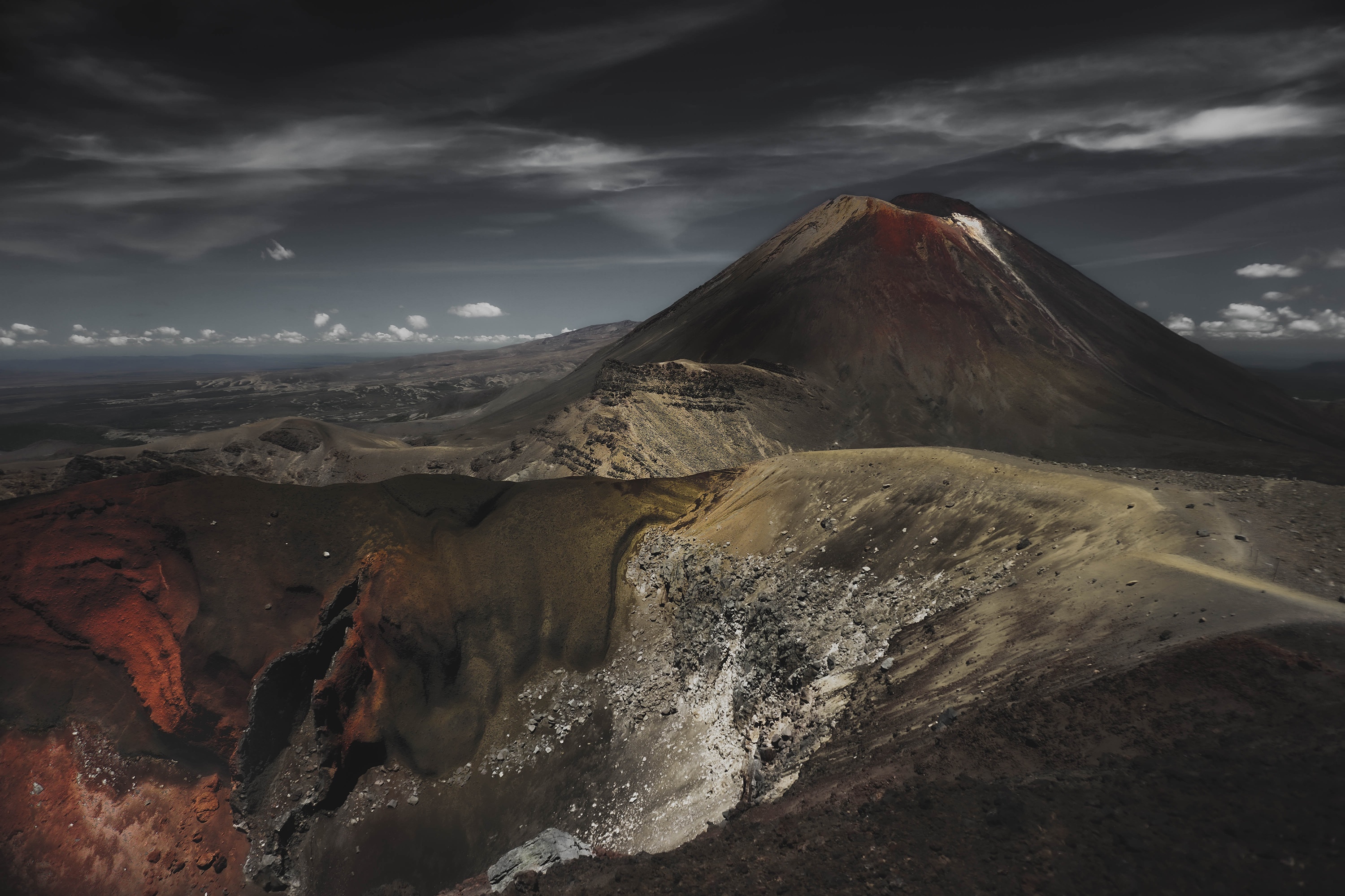 Volcanic landscape with dramatic clouds HD Wallpaper