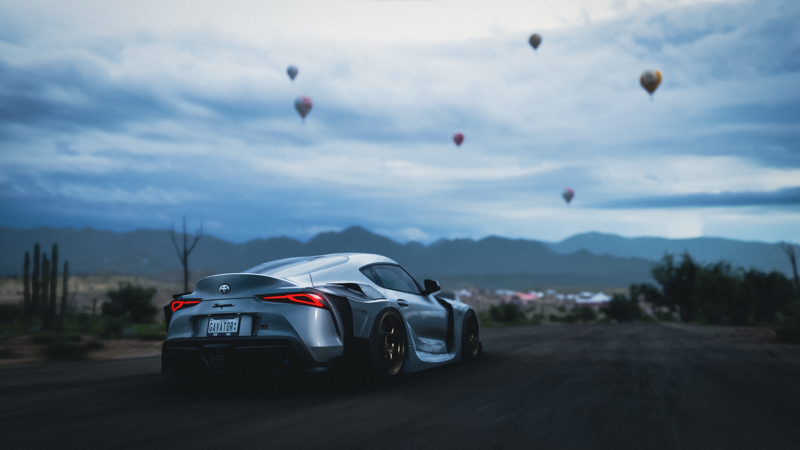 Silver Toyota Supra in Forza Horizon 5 with Hot Air Balloons HD Wallpaper