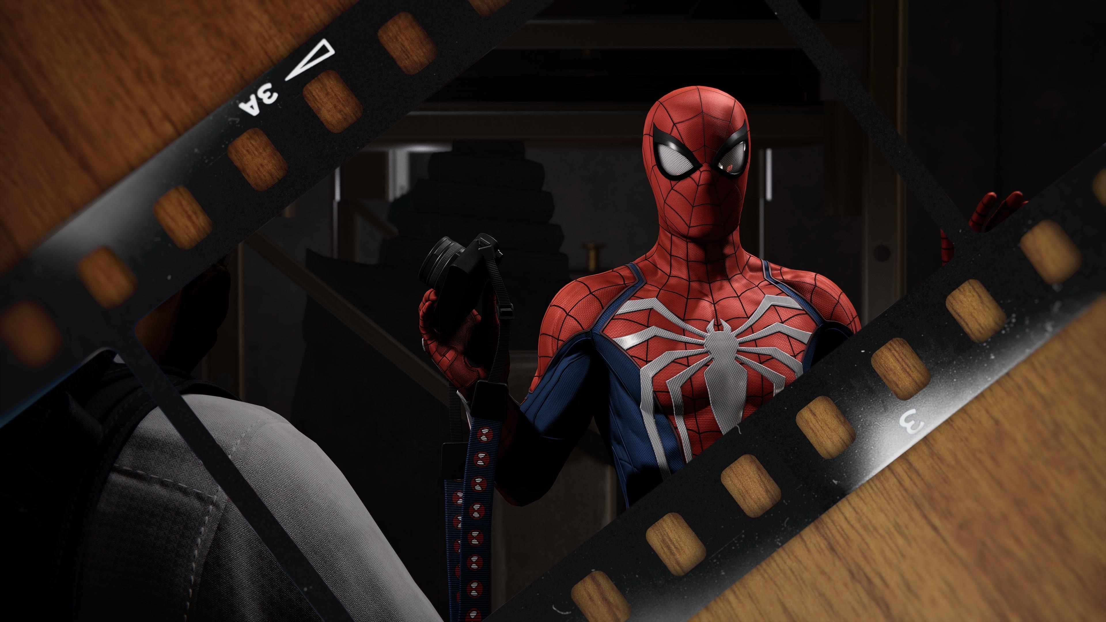 Spider-Man holding a camera through film reel HD Wallpaper
