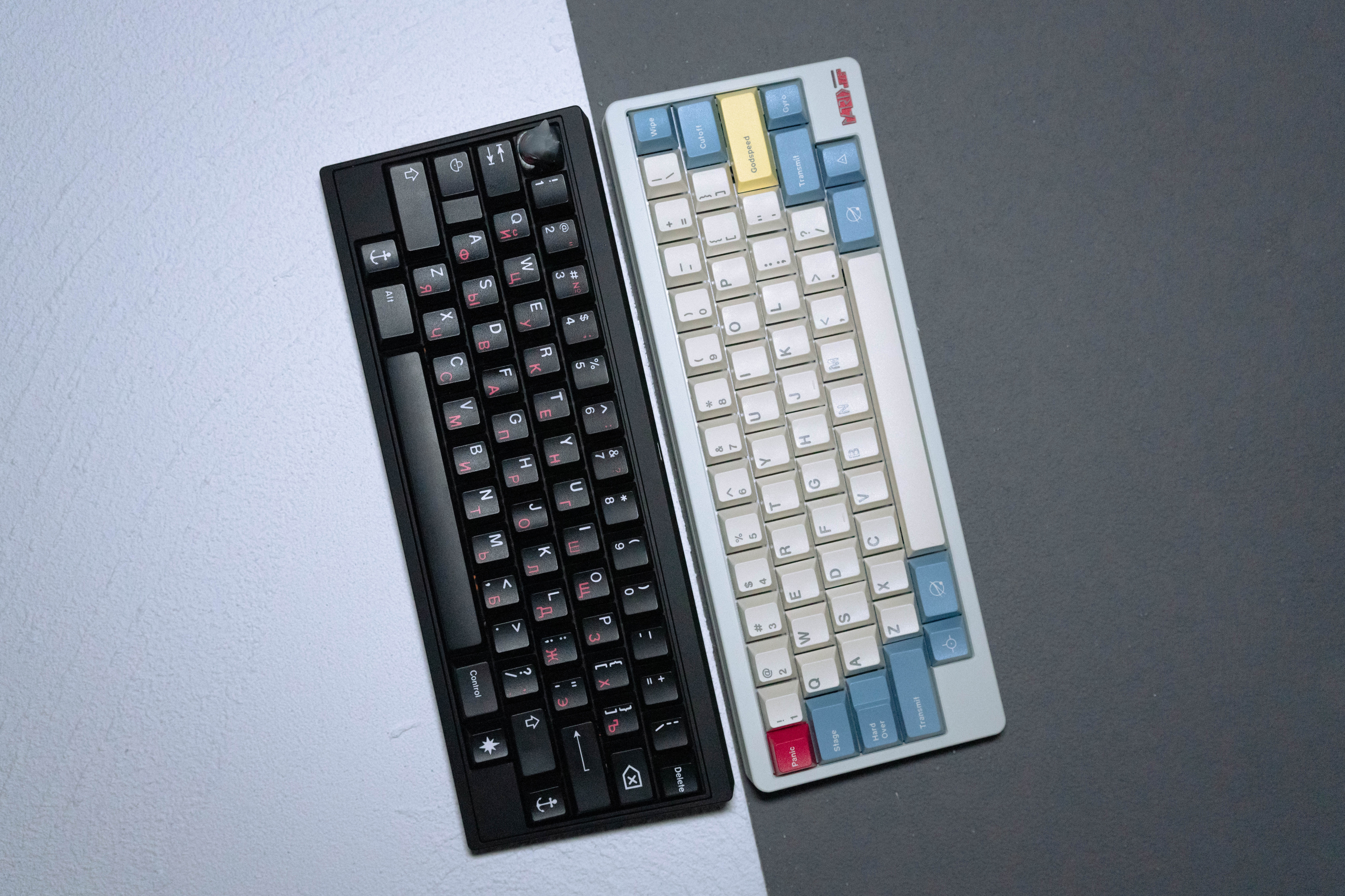 Two mechanical keyboards with Cyrillic and QWERTY layouts HD Wallpaper