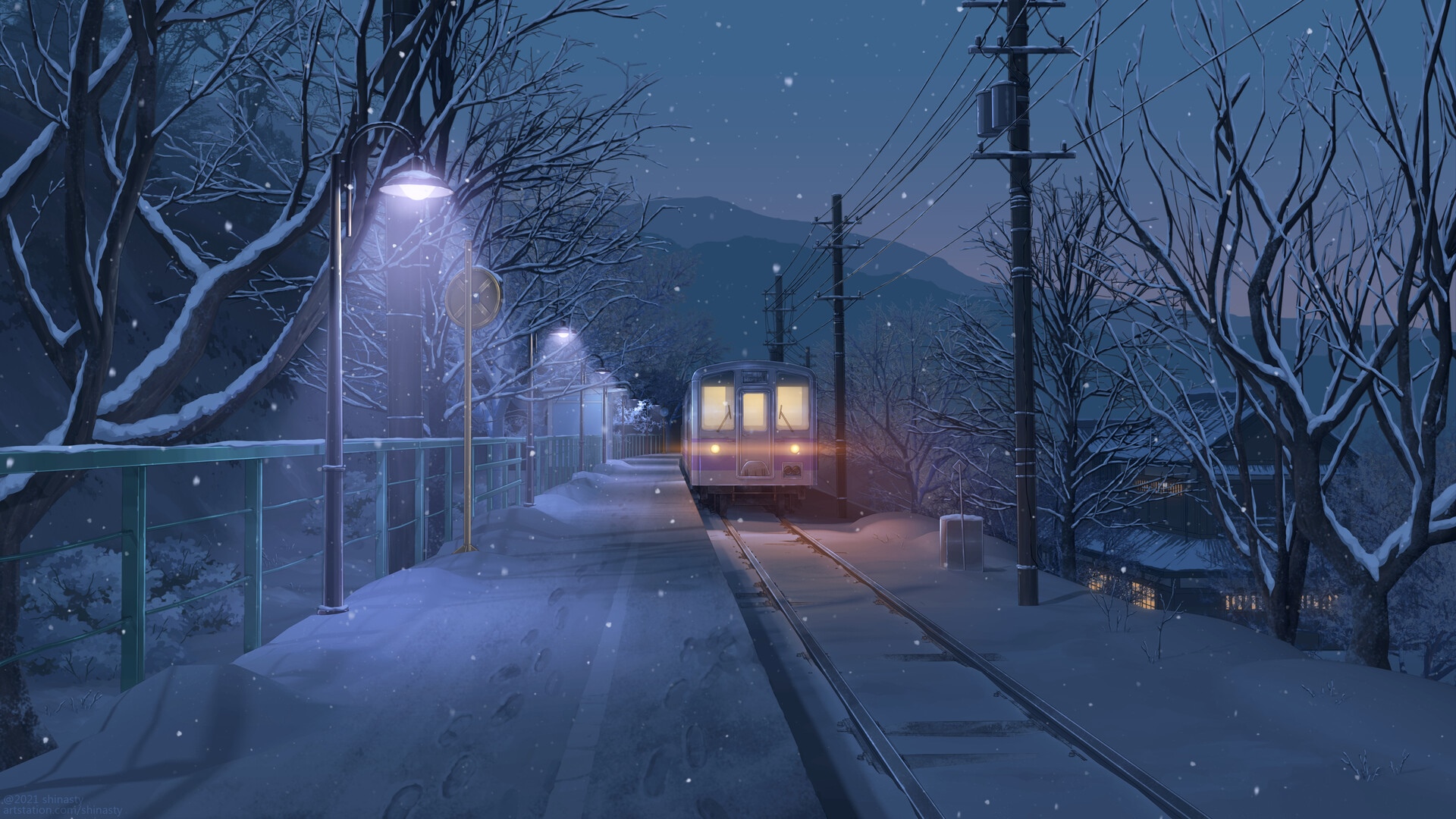 Train at a snowy station at night HD Wallpaper