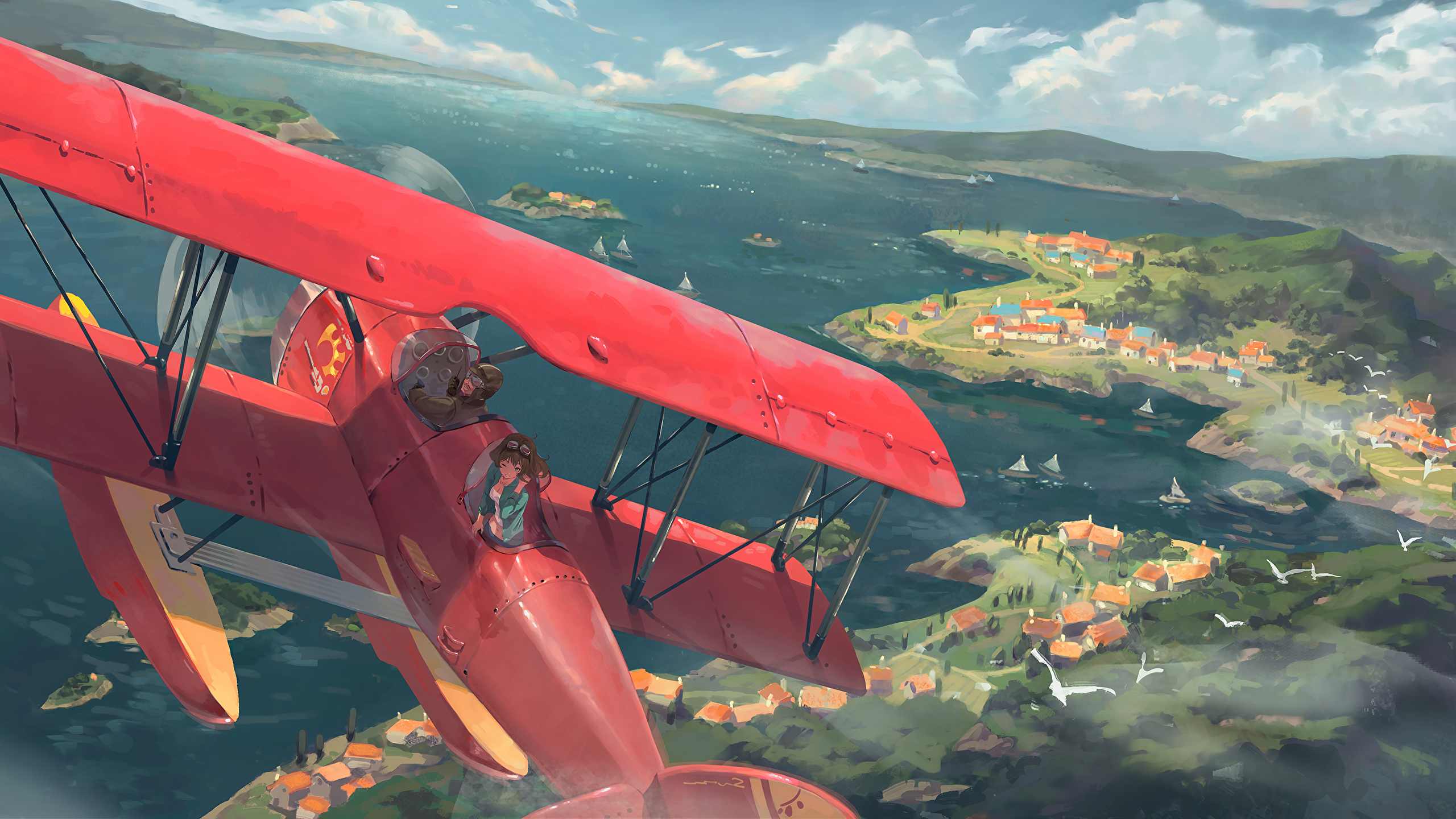 Two people flying in a red biplane over a coastal town HD Wallpaper