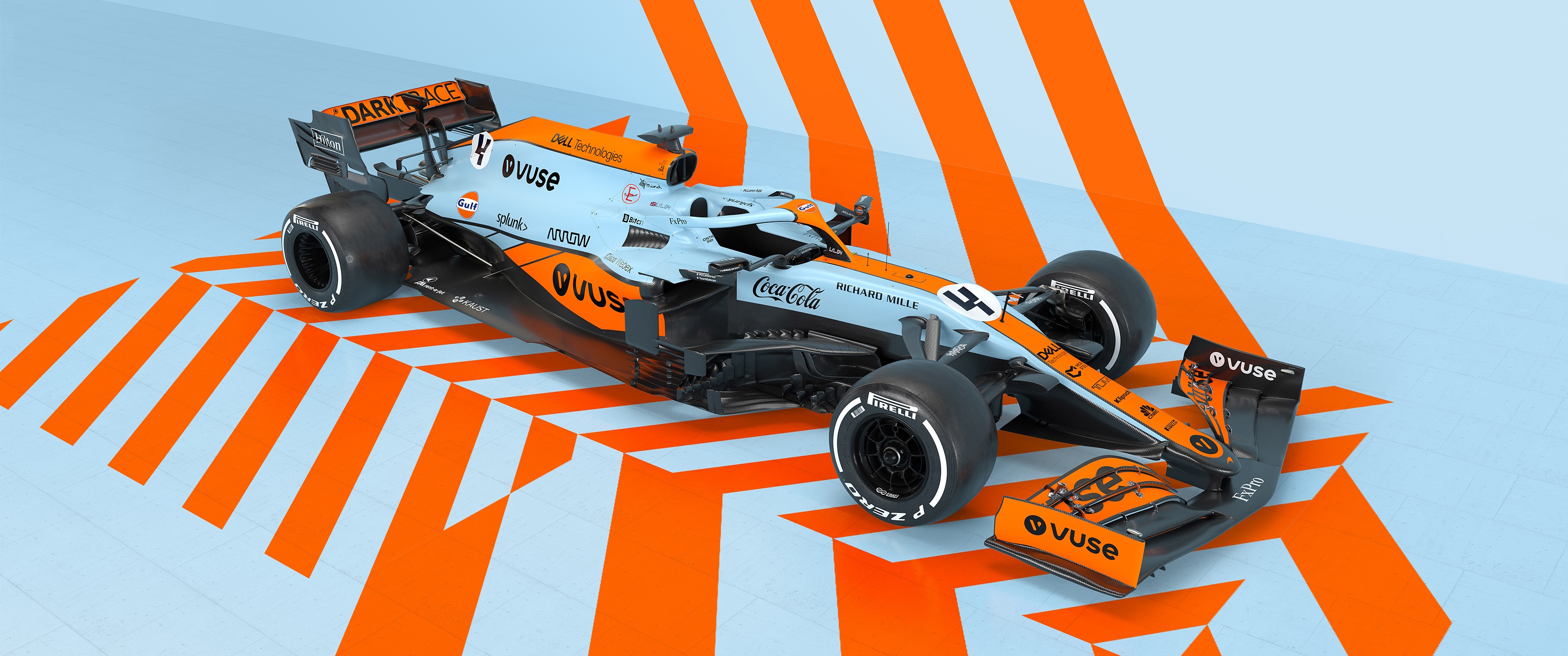 McLaren Formula 1 car with orange and white livery HD Wallpaper