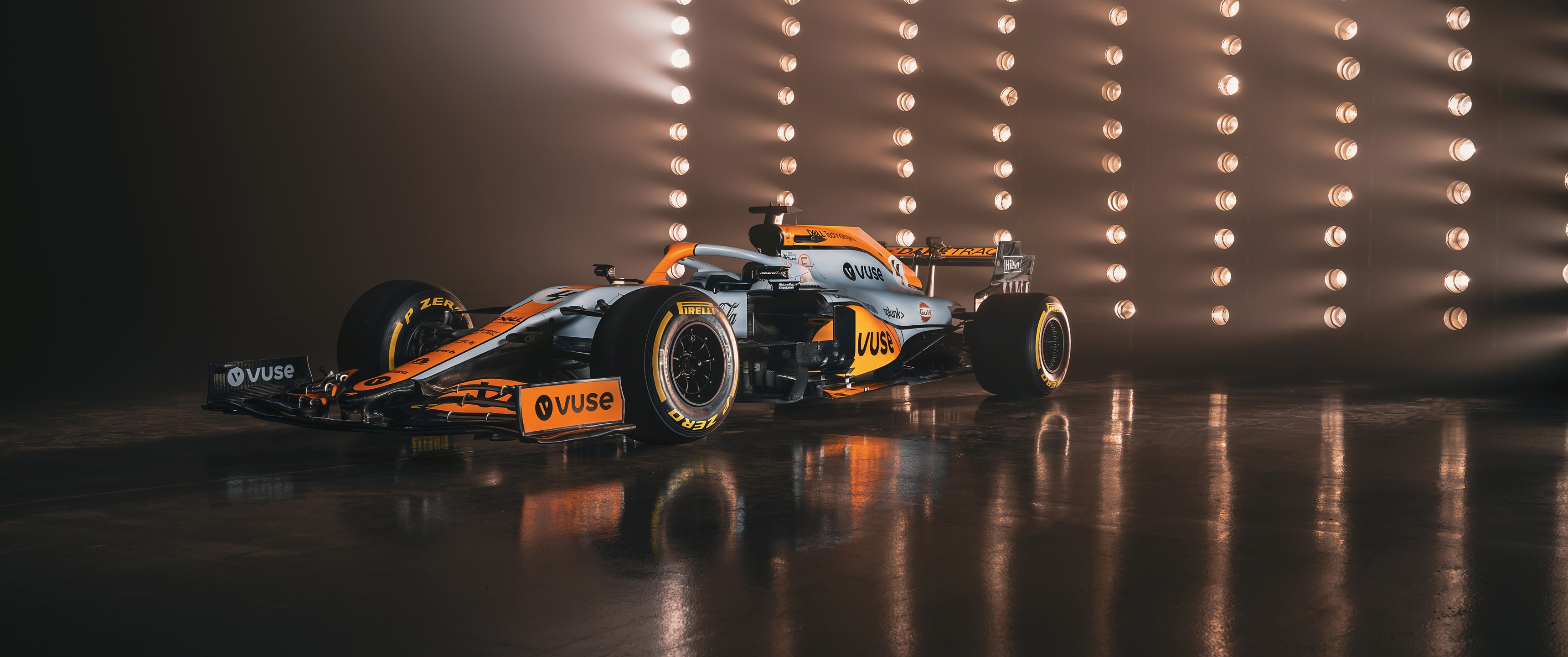 McLaren Formula 1 race car with Vuse branding HD Wallpaper