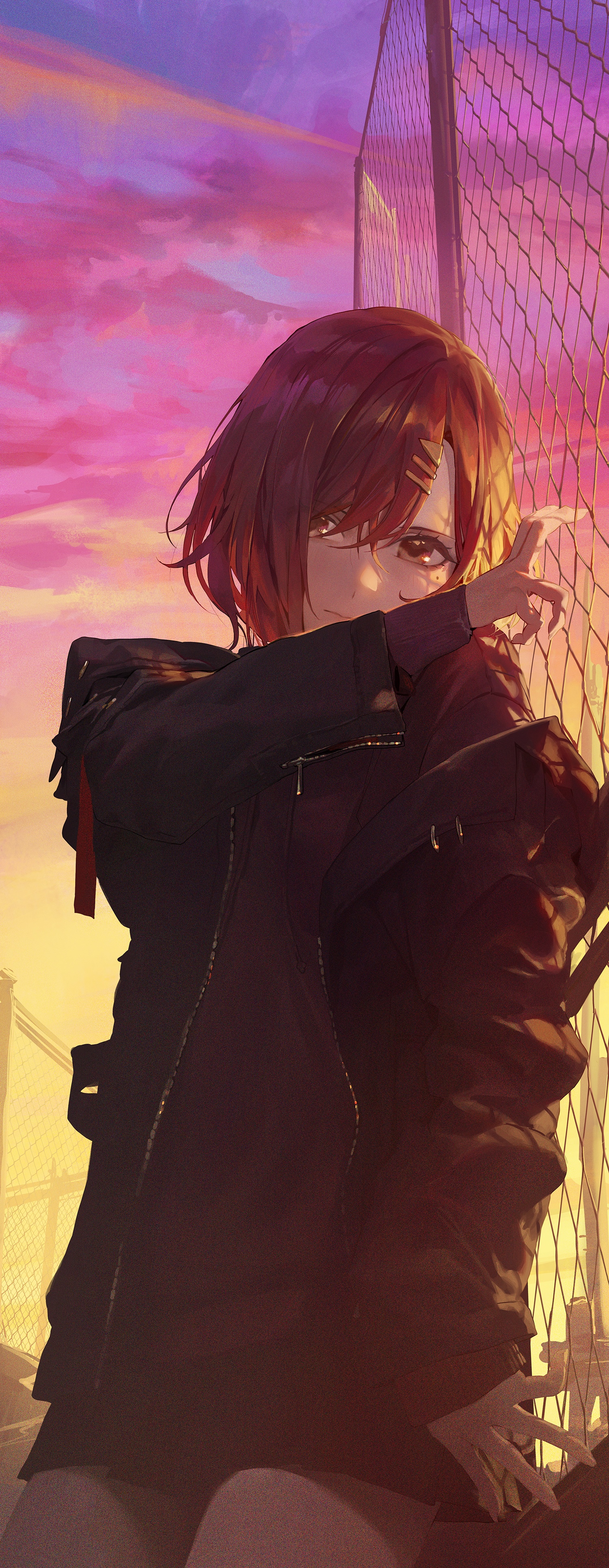 Girl in black jacket by chain-link fence at sunset HD Phone Wallpaper
