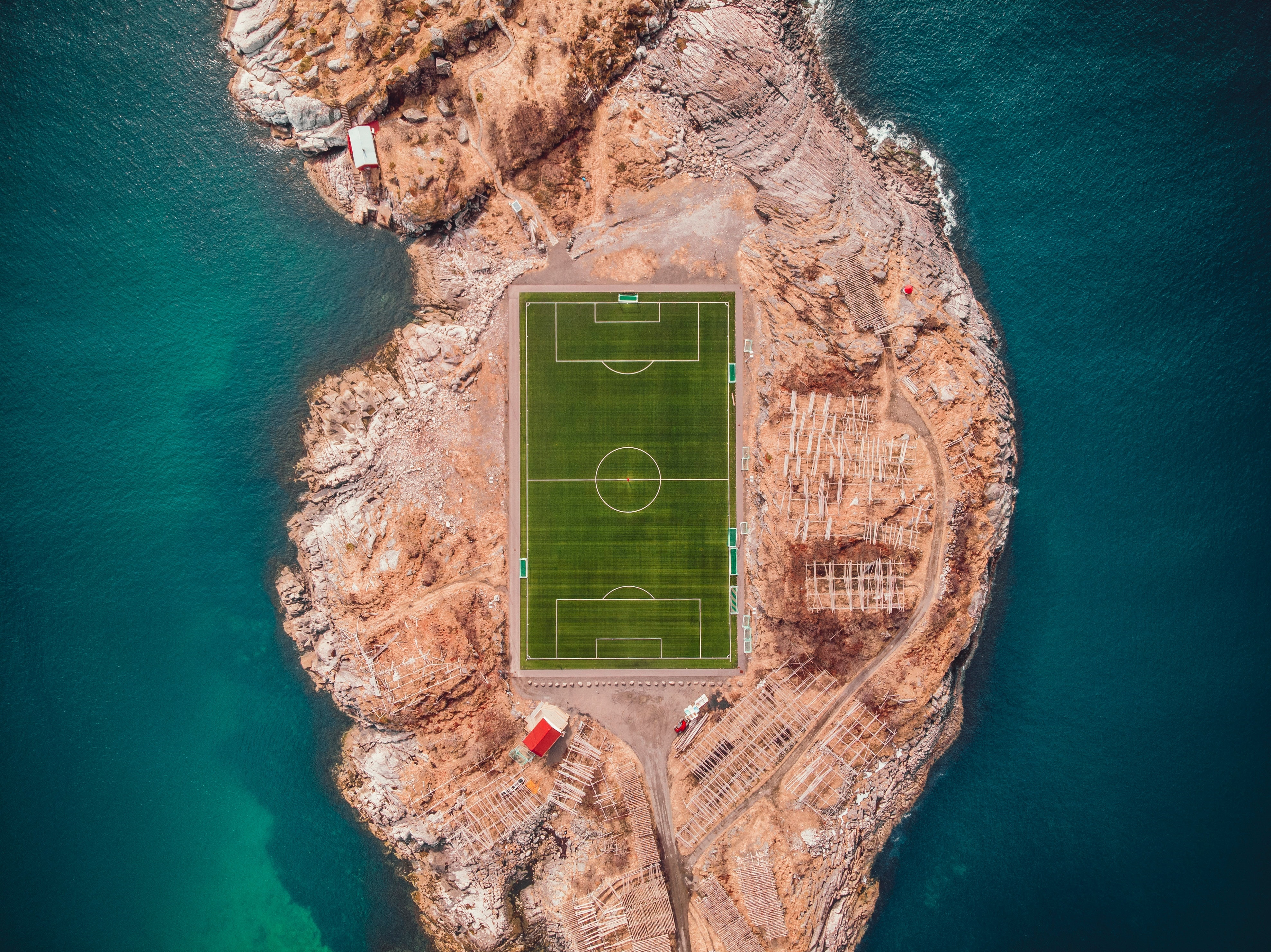 Aerial view of a soccer field on the Lofoten Islands HD Wallpaper