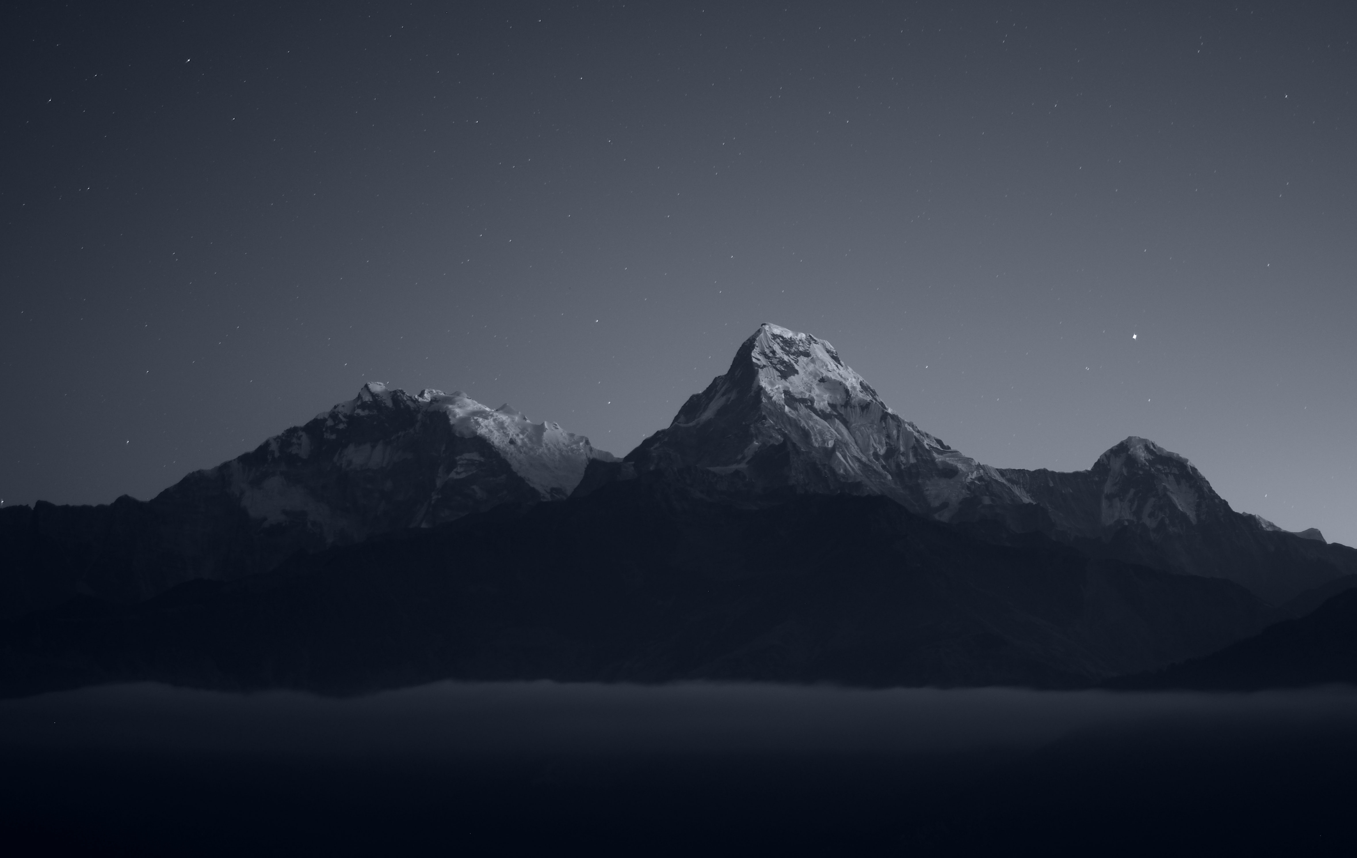 4K dark snowy mountains under starry sky HD Wallpaper