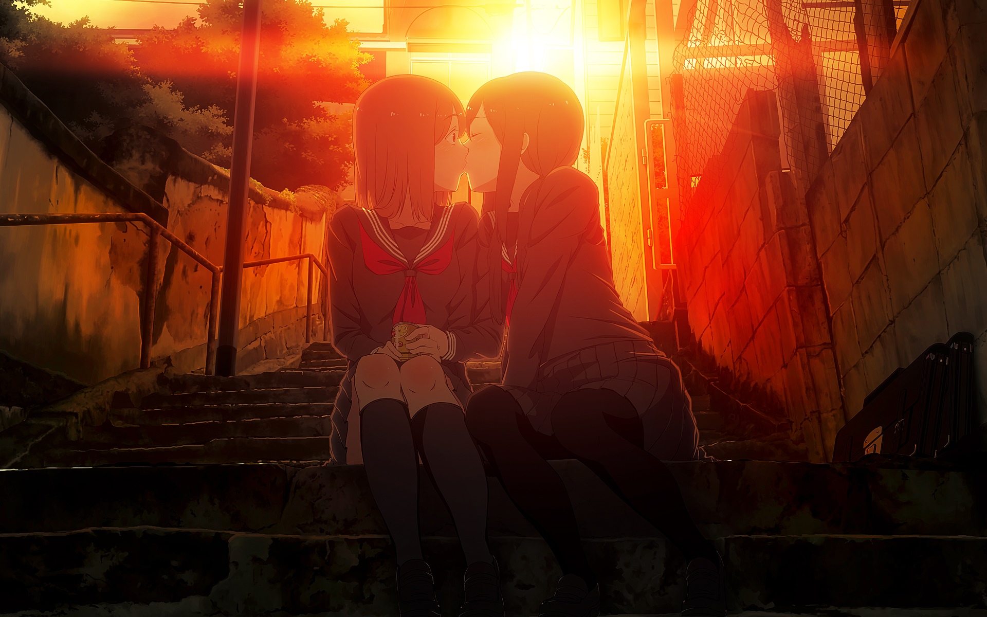 Two girls in school uniforms kissing at sunset HD Wallpaper