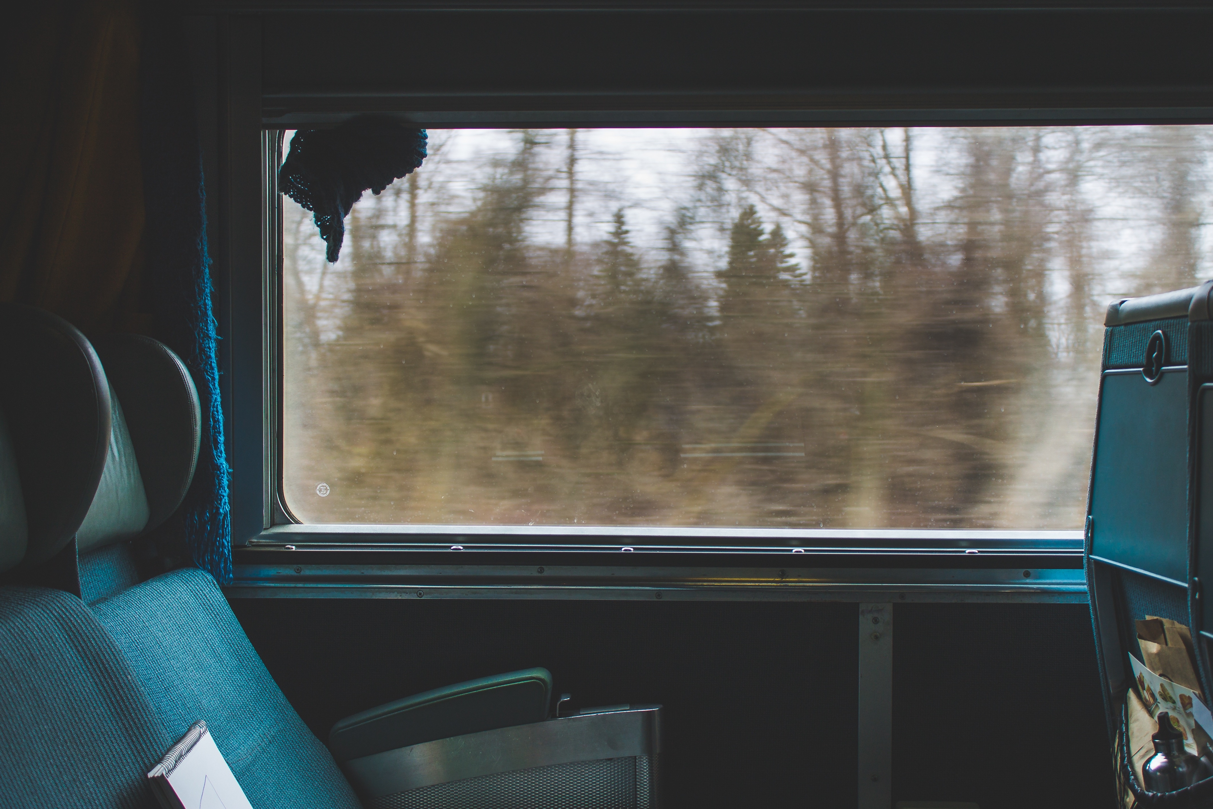 Train window with motion blur of trees HD Wallpaper