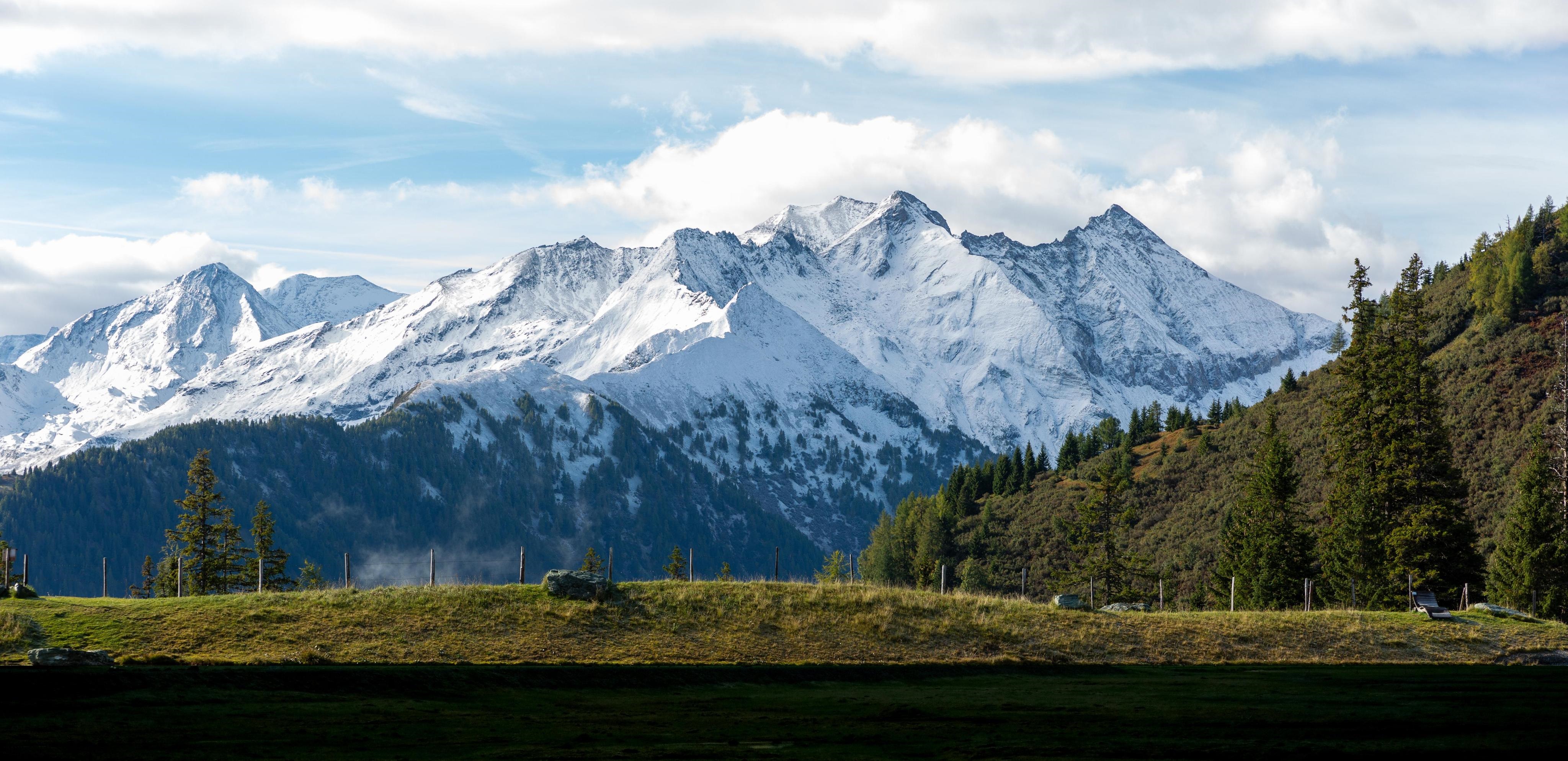 4K snowy mountain landscape with forest and hills HD Wallpaper