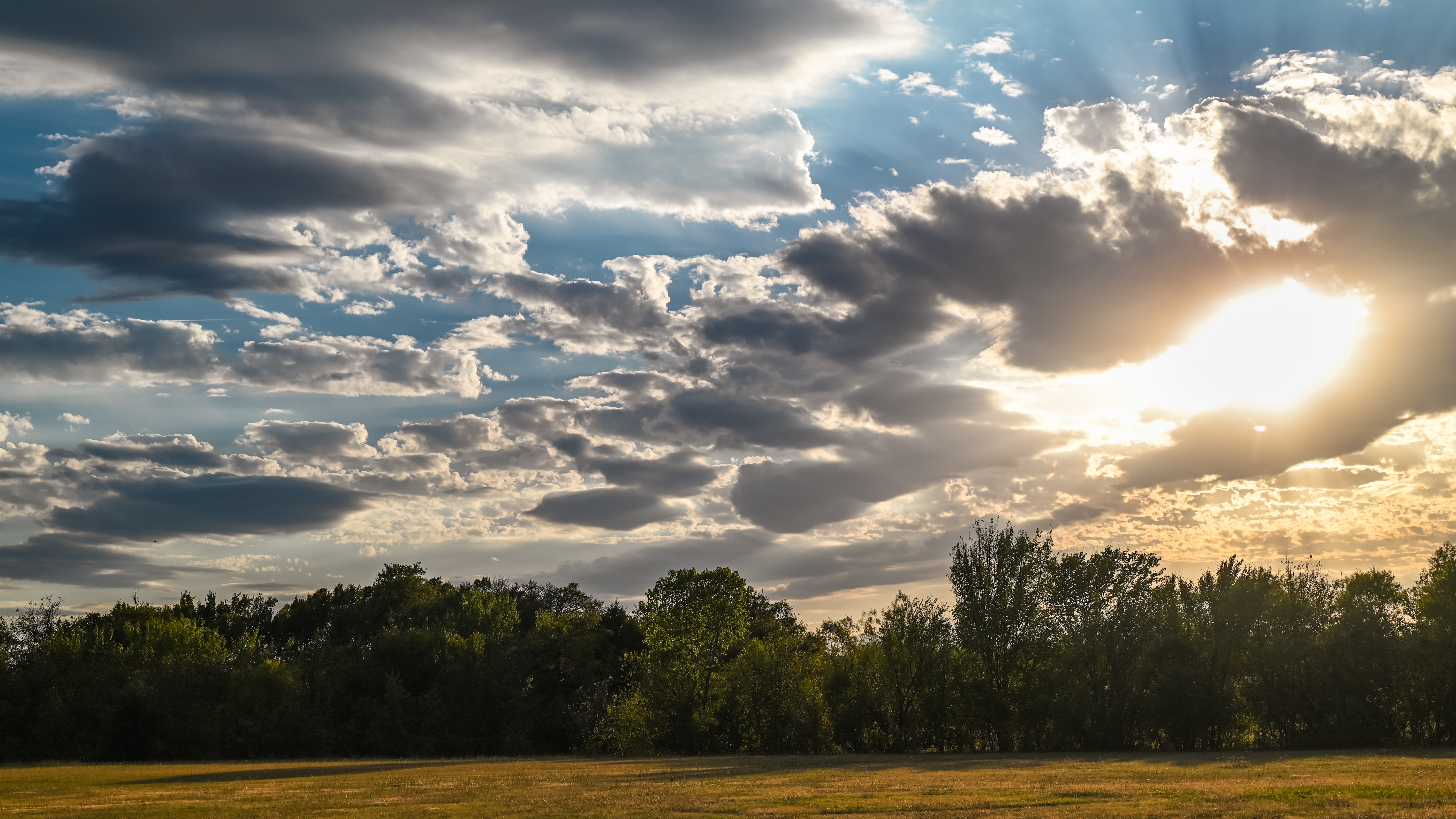 4K Landscape with Sunset Clouds Over Trees HD Wallpaper