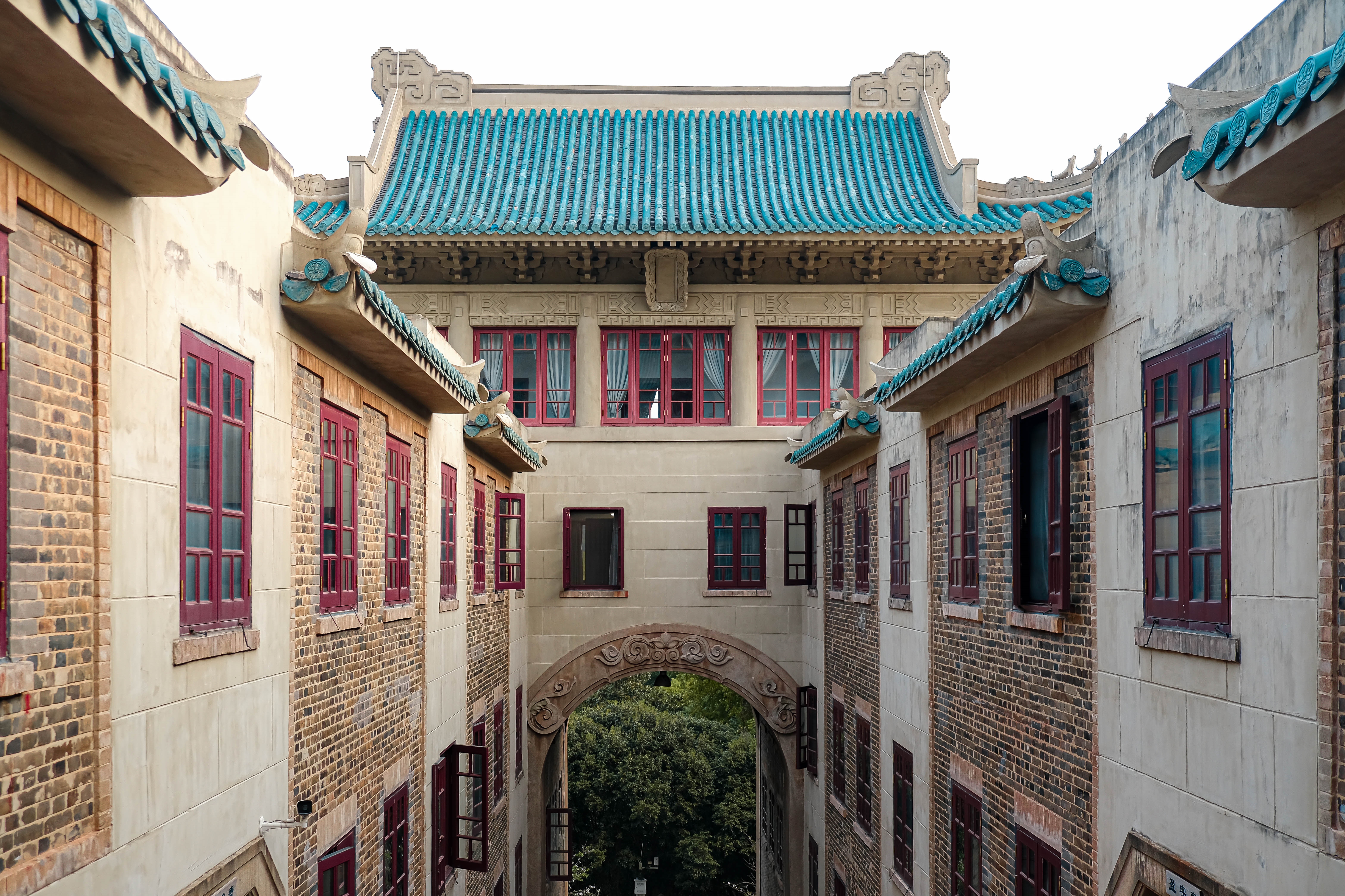 Traditional Chinese Architecture with Blue Roofs HD Wallpaper