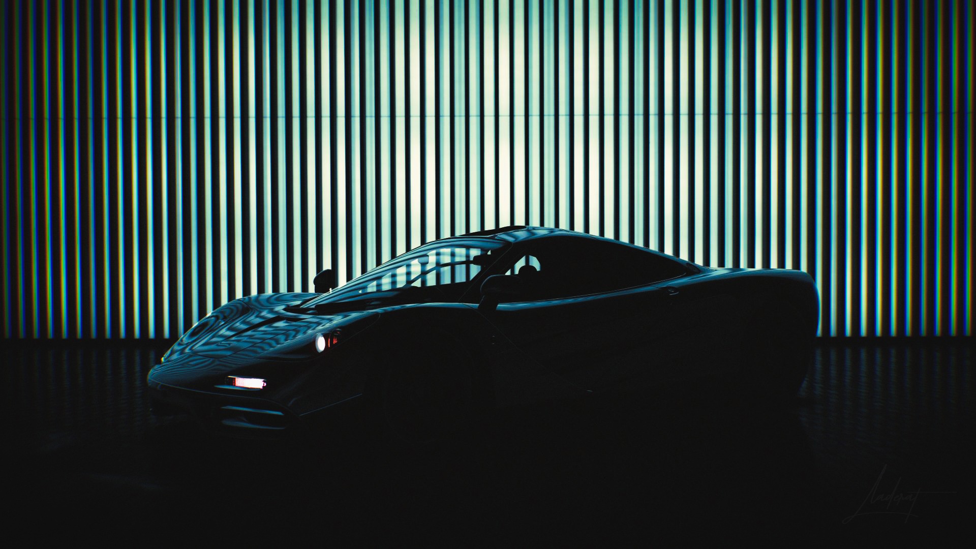 McLaren F1 car in front of a striped background HD Wallpaper