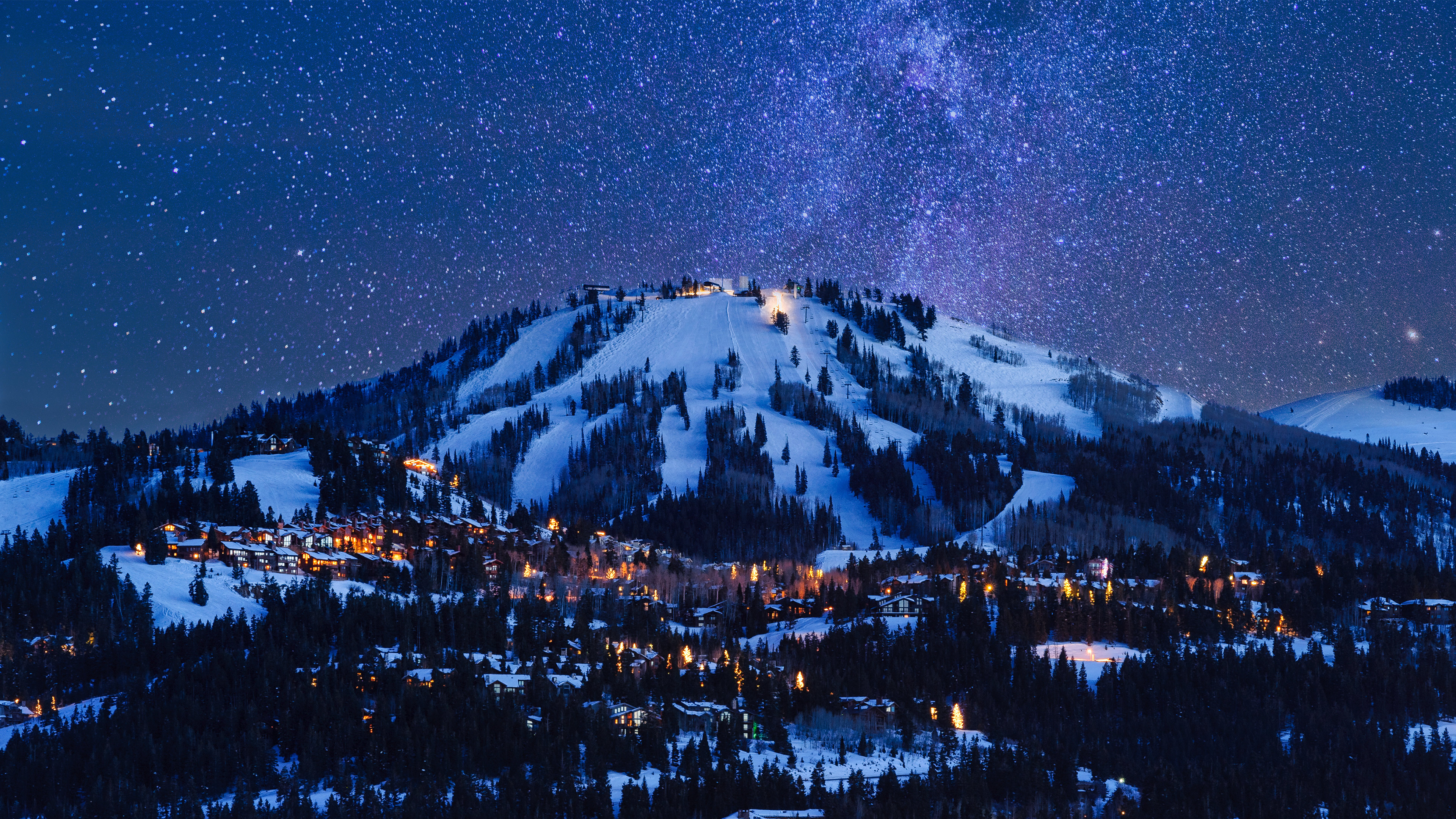 Snowy mountains village at night under starry sky HD Wallpaper