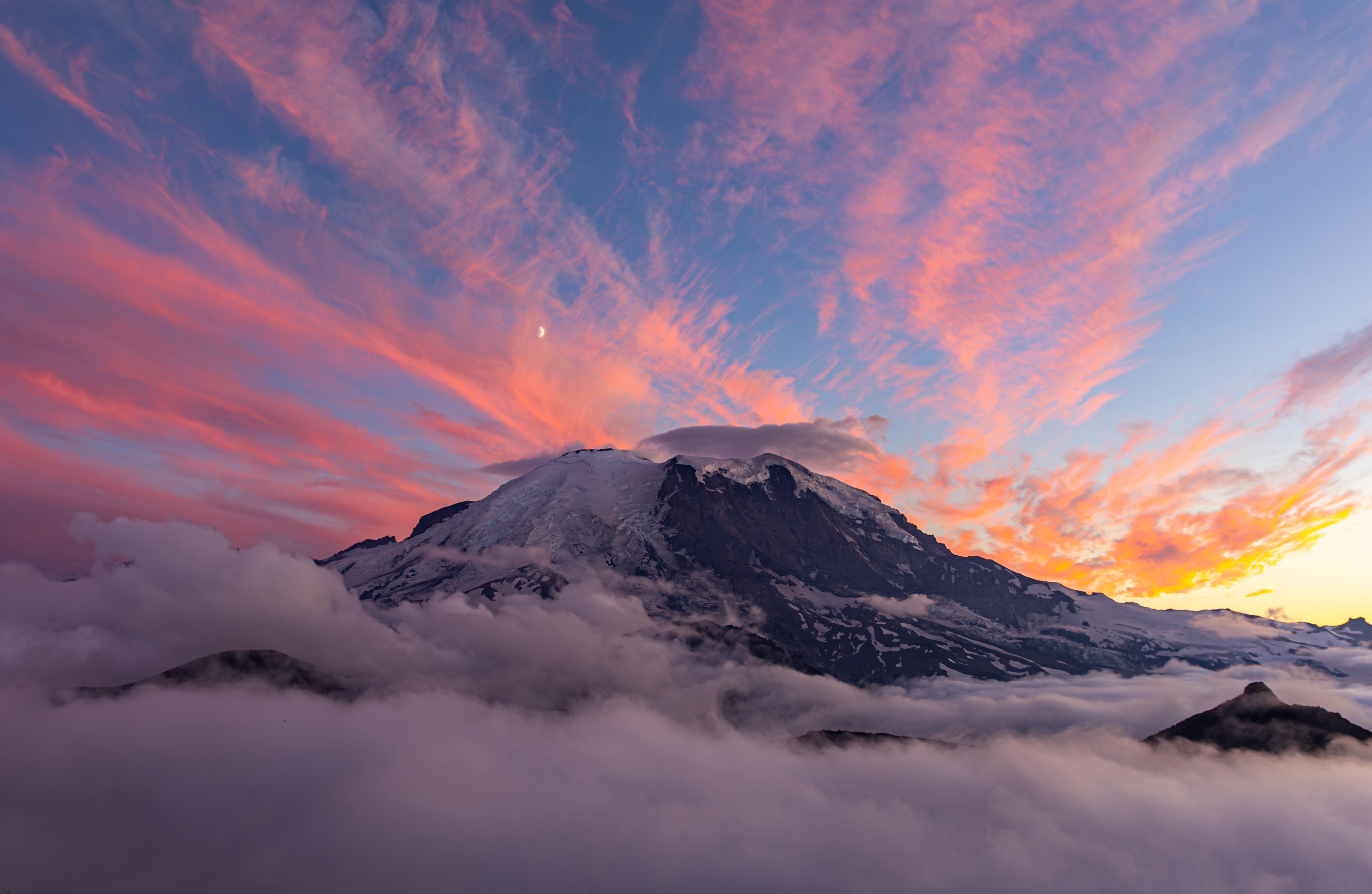 Sunset over snow-capped mountain with clouds and moon HD Wallpaper