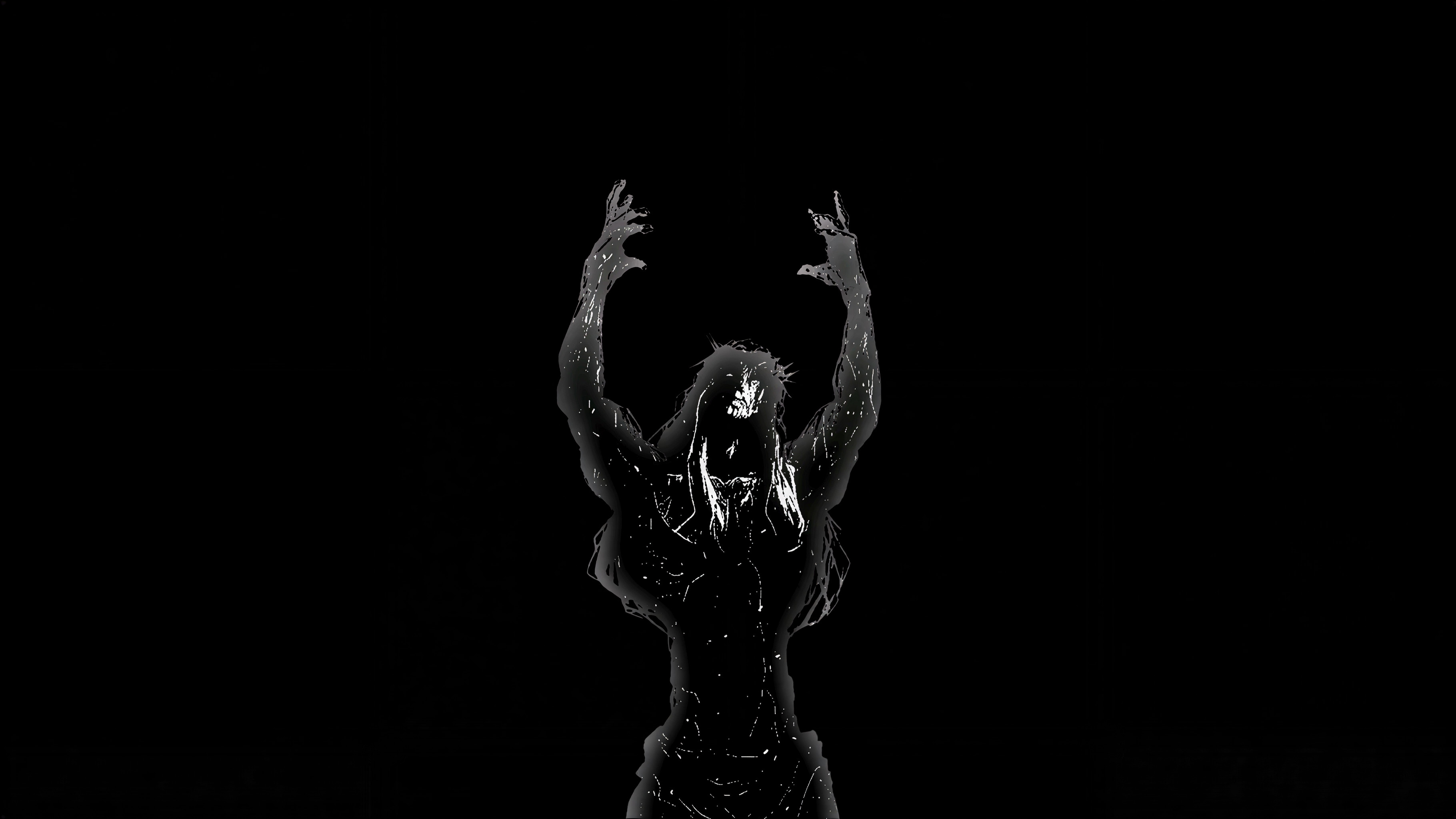 A dark figure with long hair and arms raised HD Wallpaper