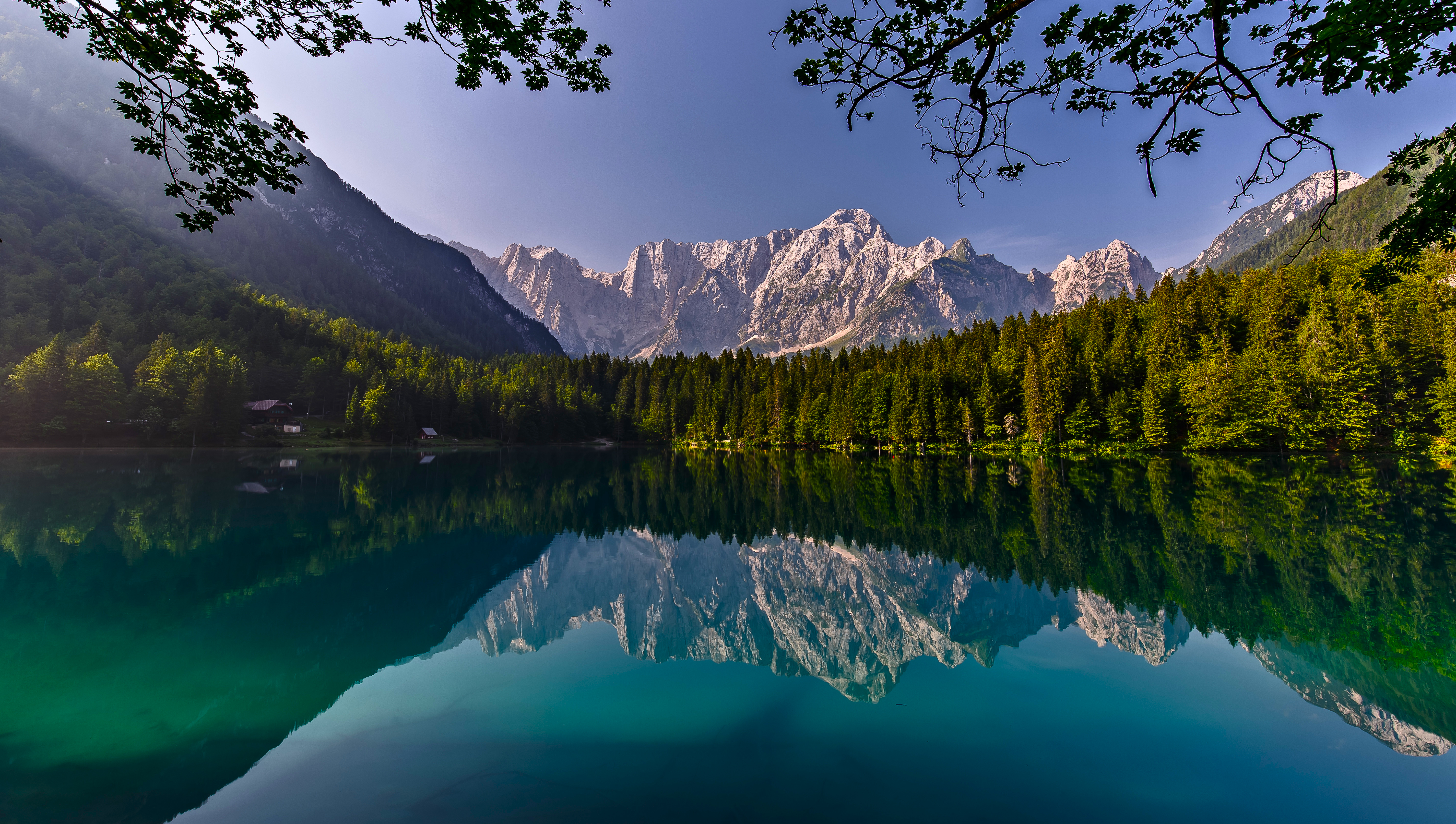 Lake reflection of mountains and forest under clear sky HD Wallpaper