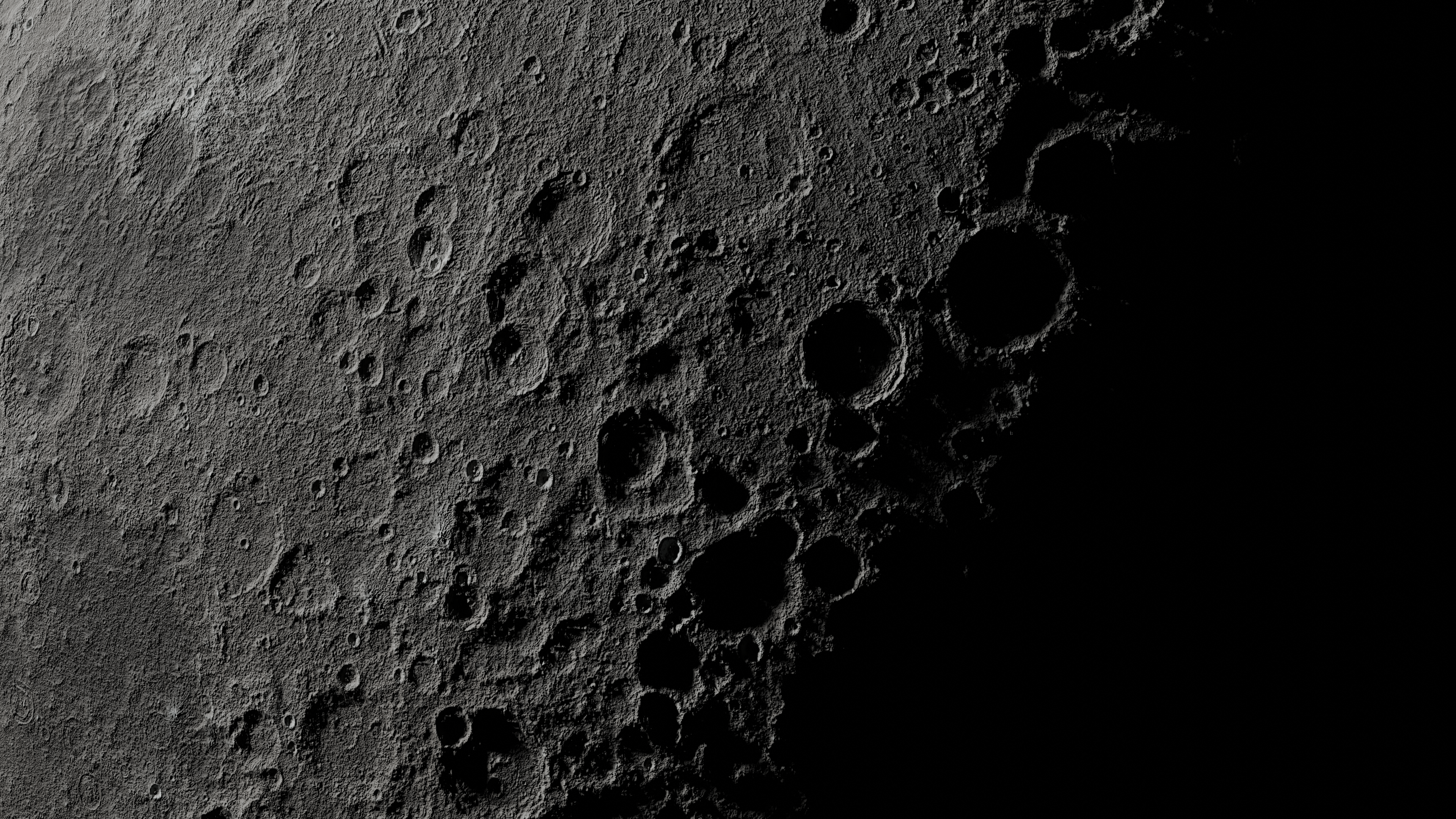 Lunar surface with craters in 4K HD Wallpaper