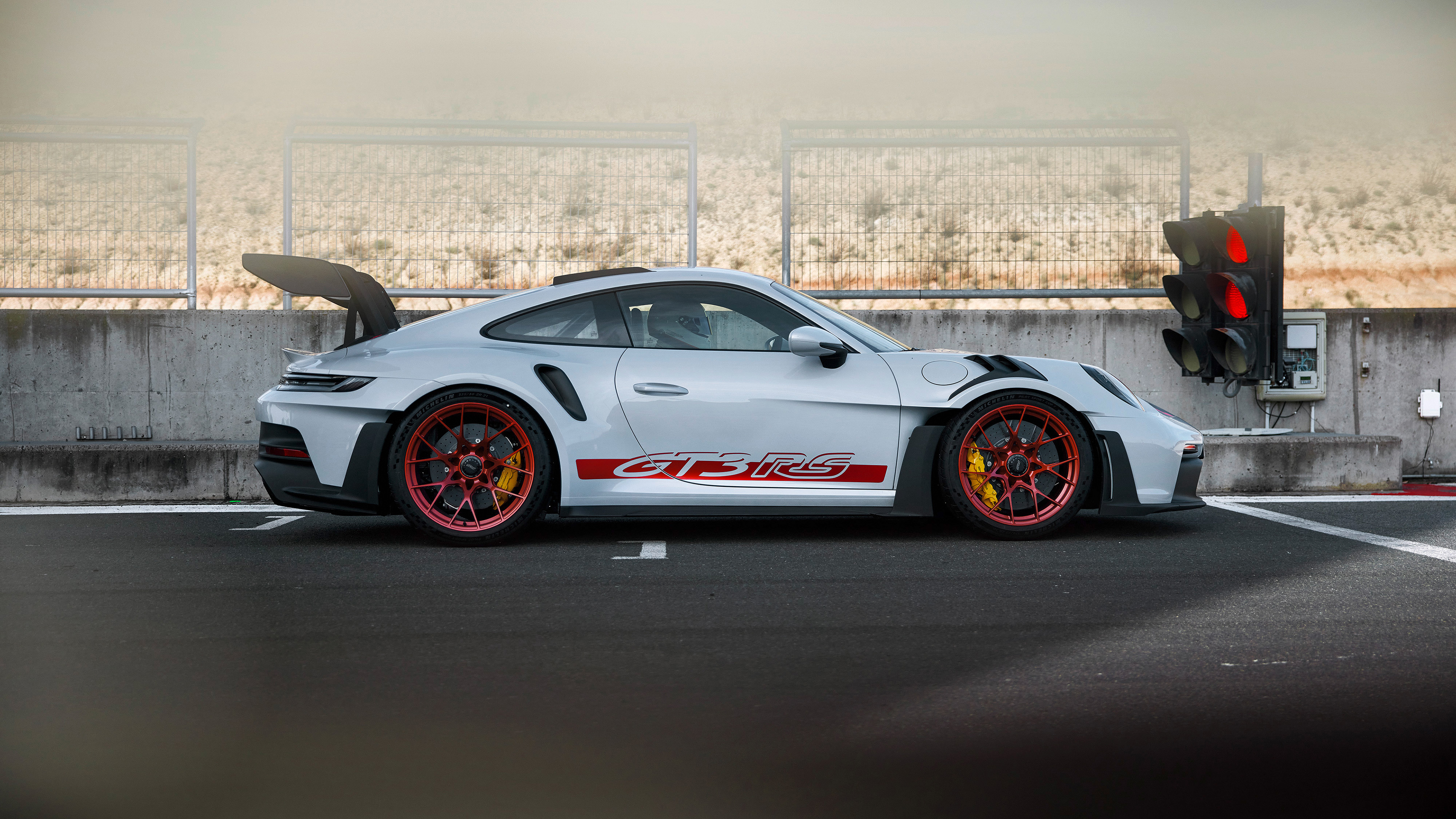 Porsche 911 GT3 RS on a race track HD Wallpaper