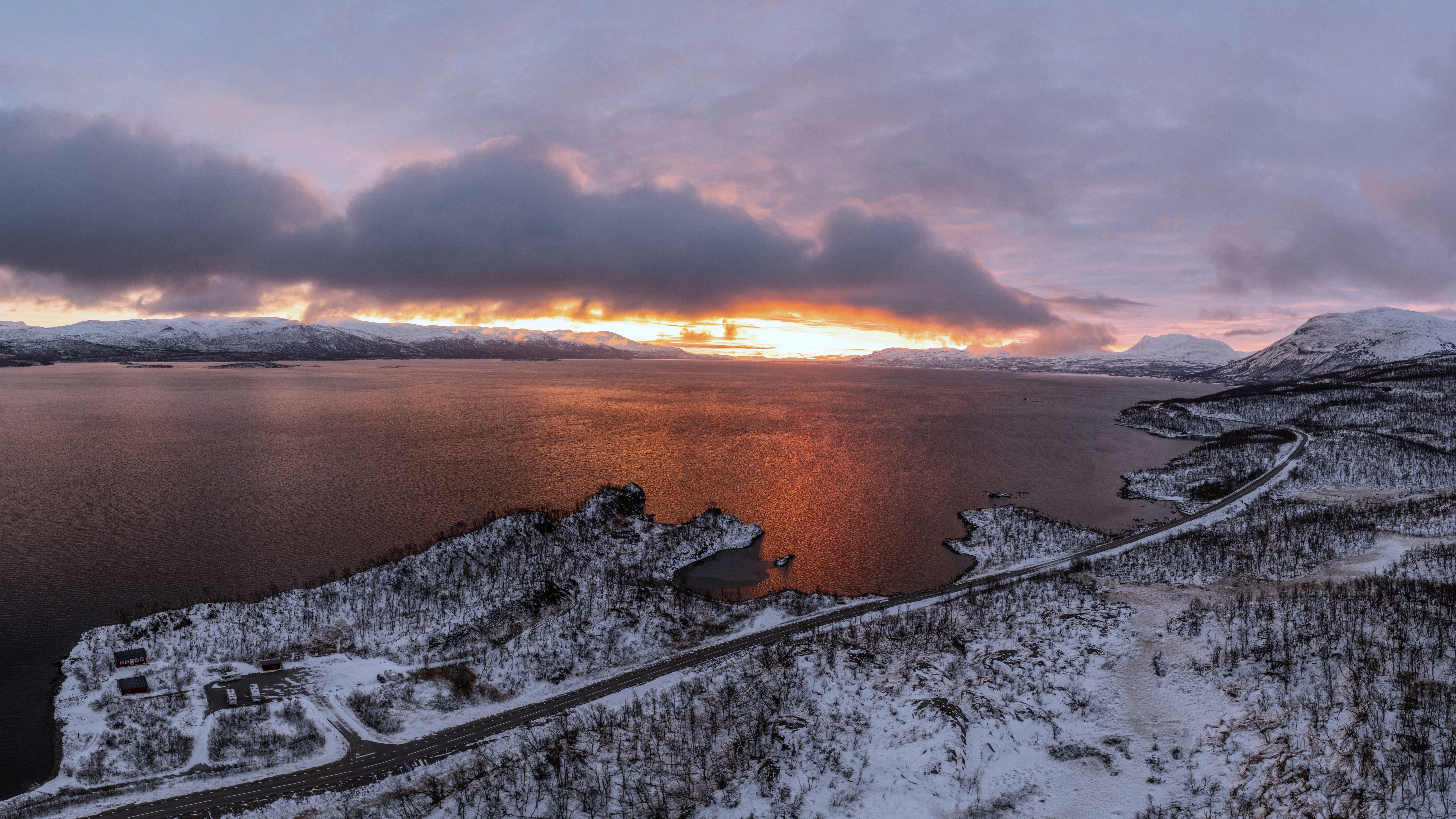 Snowy winter landscape with a lake and sunset clouds HD Wallpaper