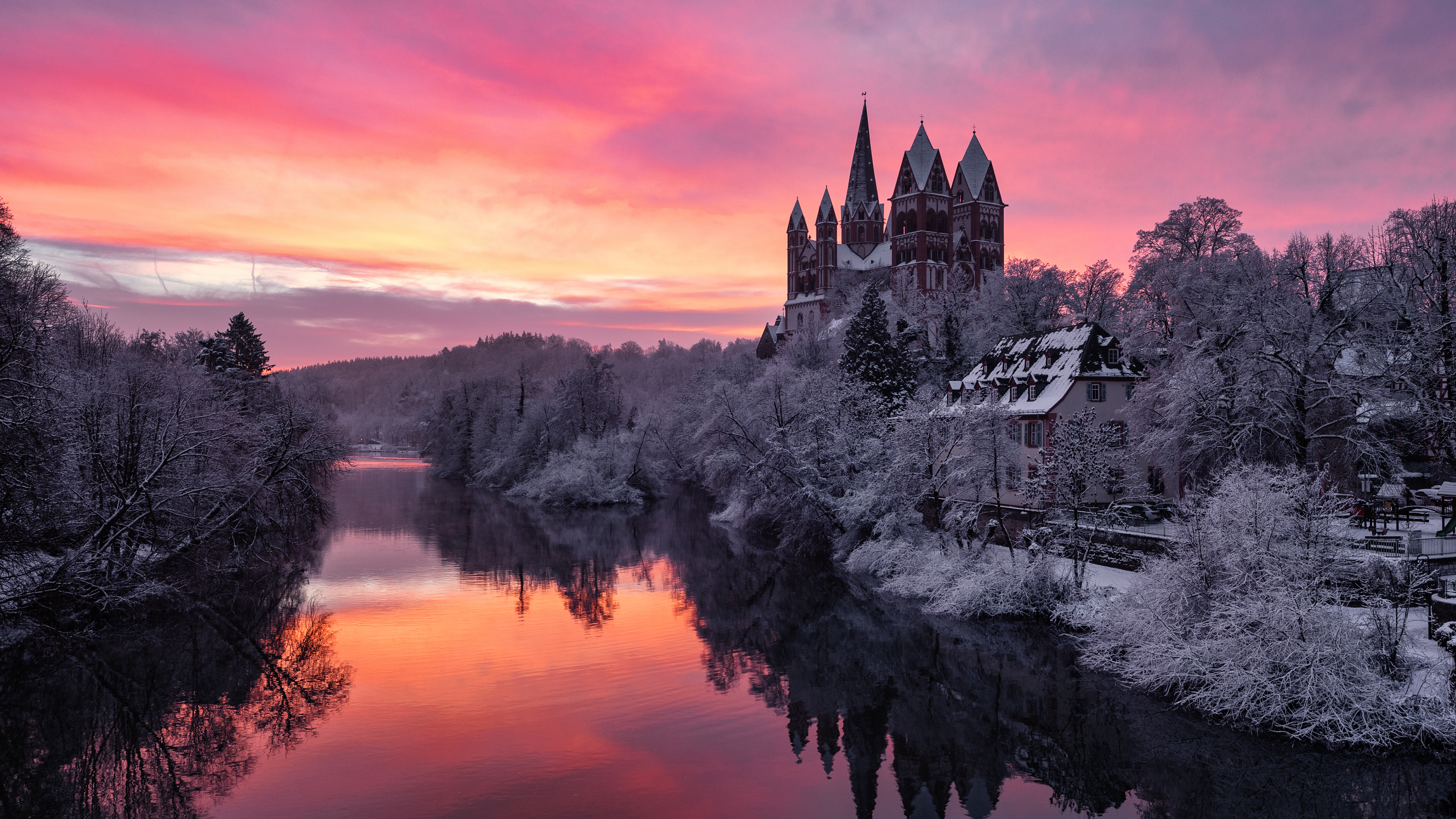 Winter sunrise over a river with a castle HD Wallpaper