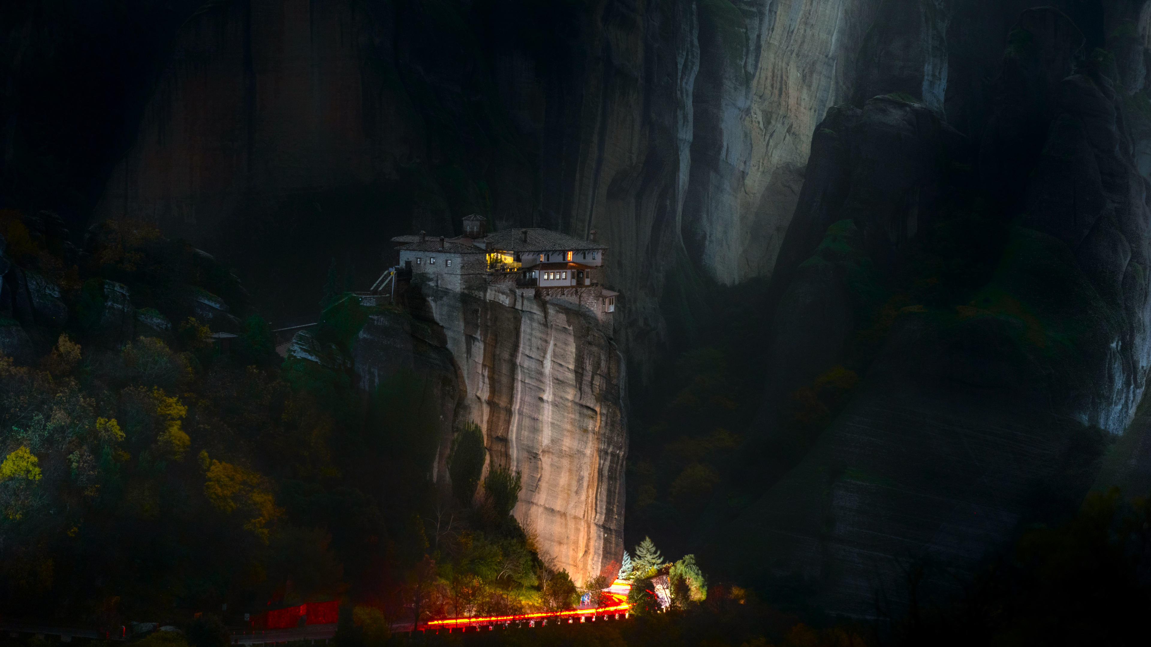 Monastery on a rock formation at night in Meteora, Greece HD Wallpaper