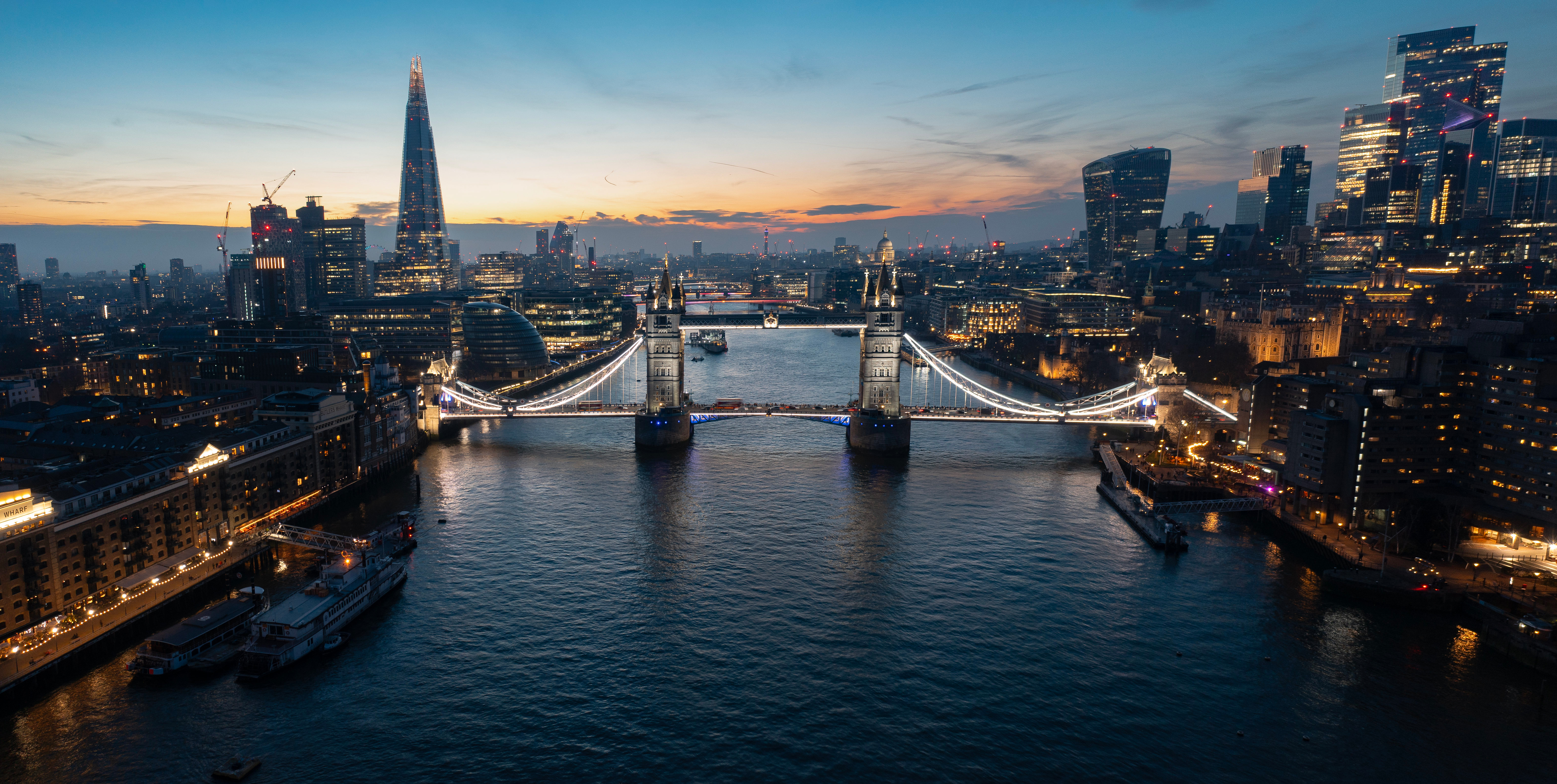 Tower Bridge and London skyline at dusk HD Wallpaper