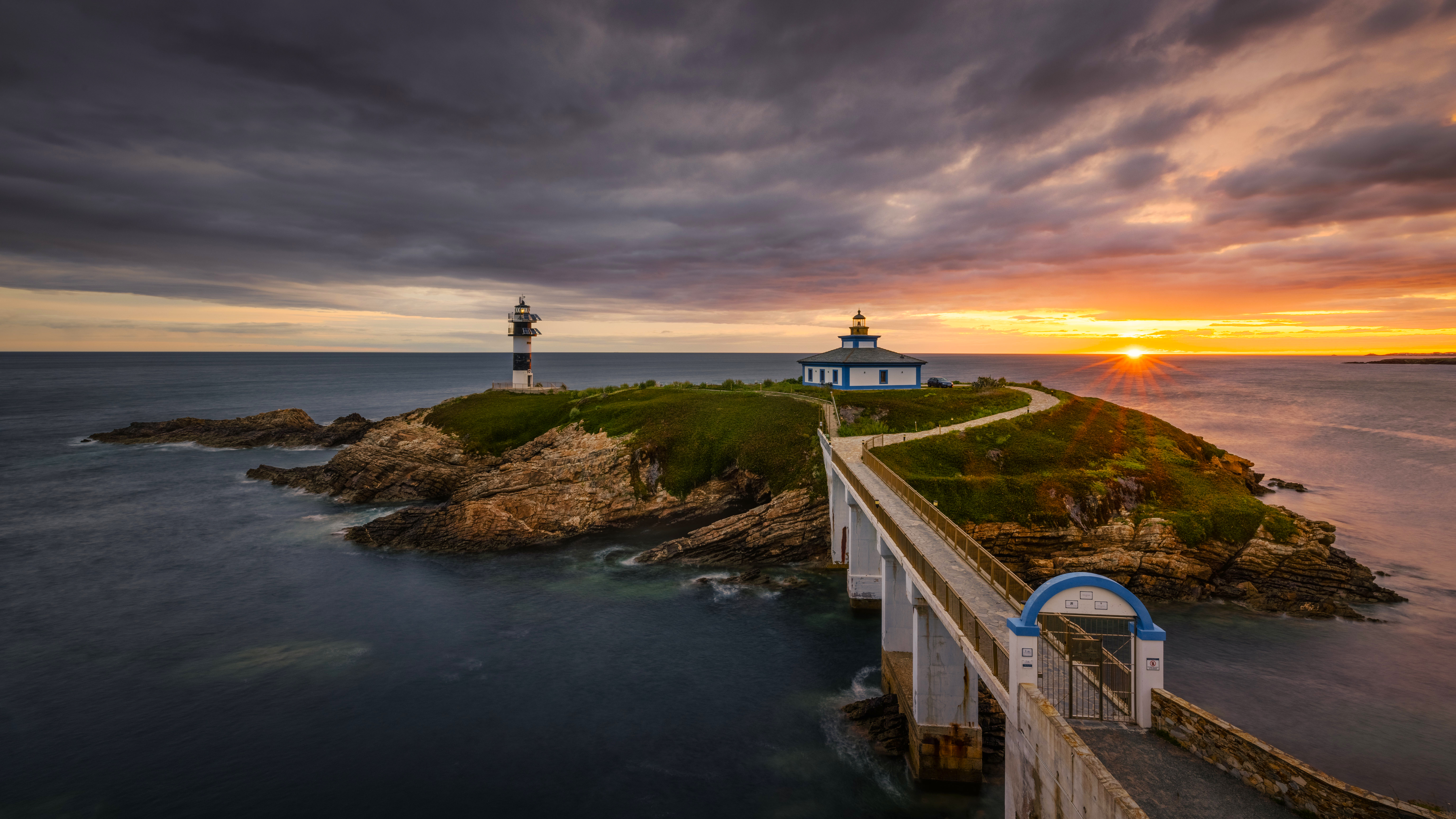 Island lighthouse and bridge at sunset HD Wallpaper