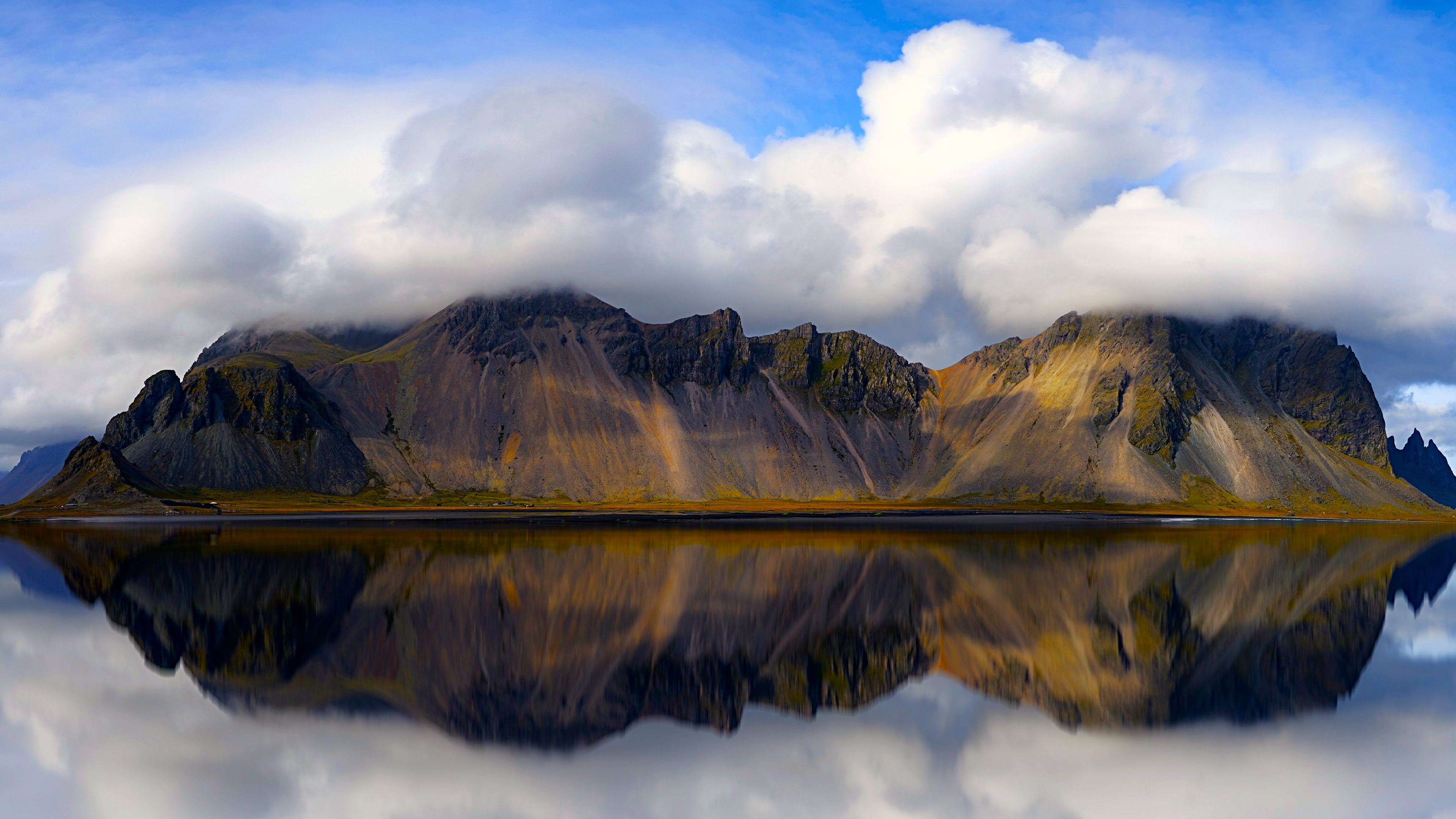 Vestrahorn mountains reflected in calm water, Iceland HD Wallpaper