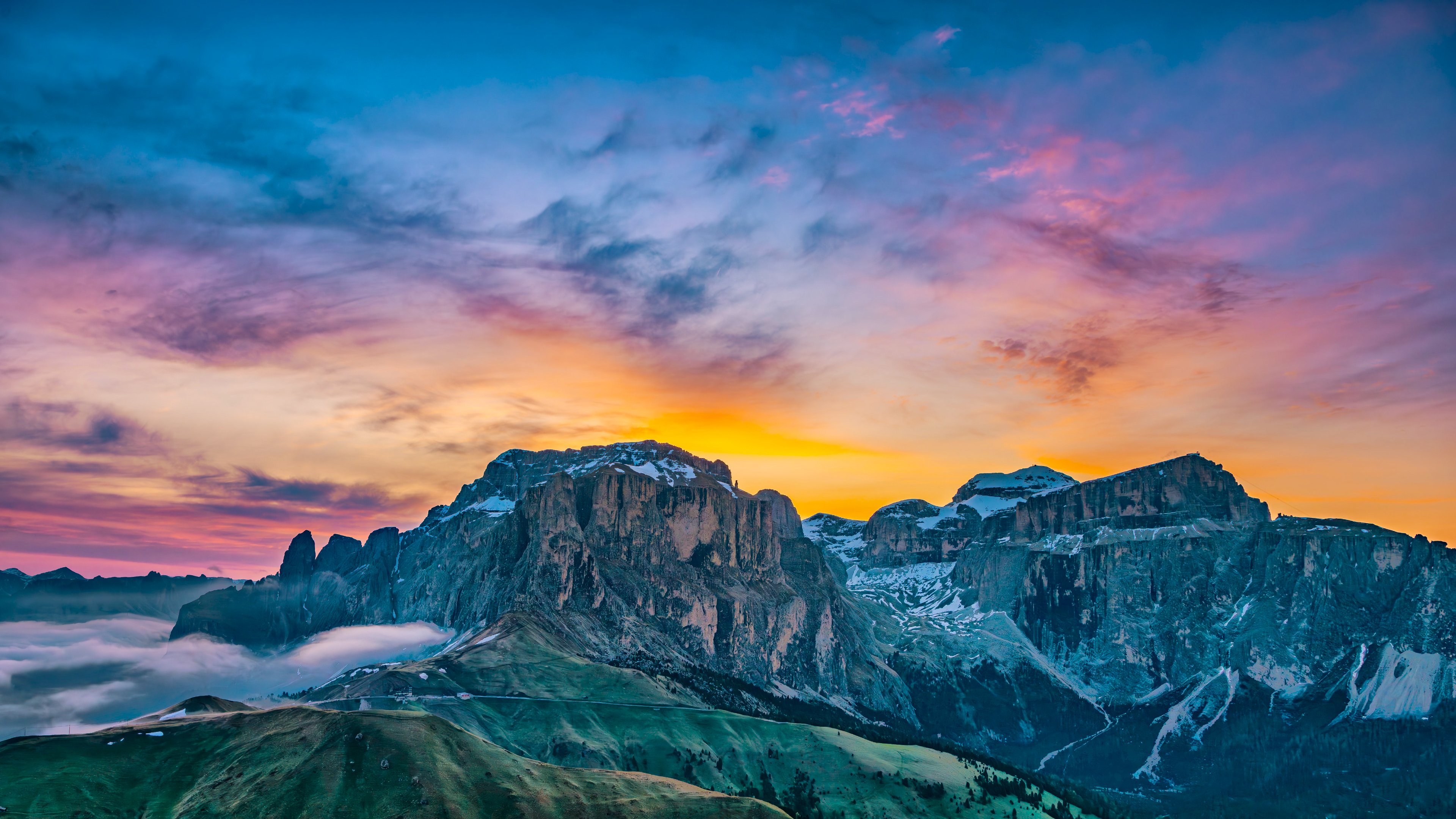 Majestic mountain range at sunrise with colorful clouds HD Wallpaper