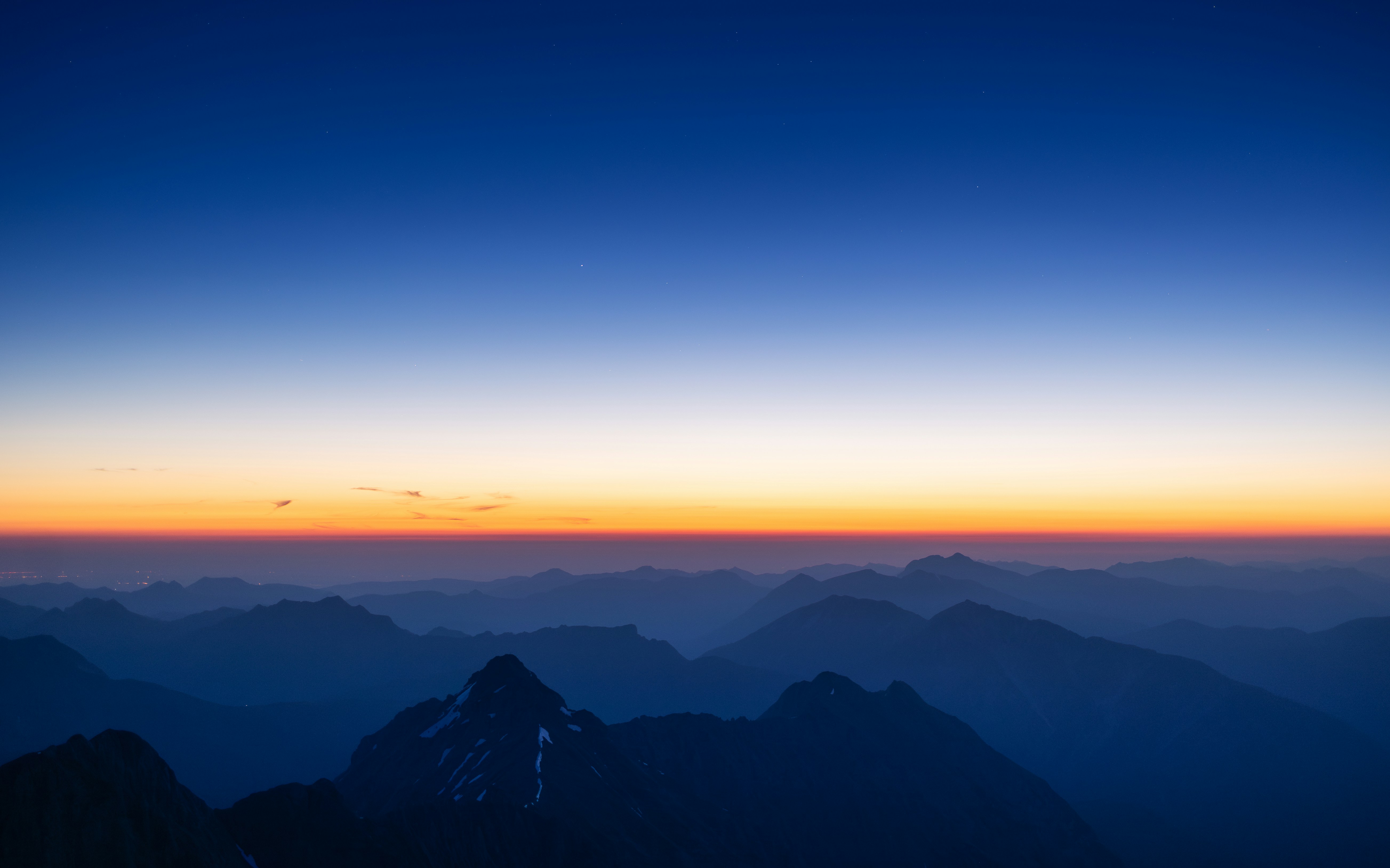 Mountain range at sunset with gradient sky HD Wallpaper
