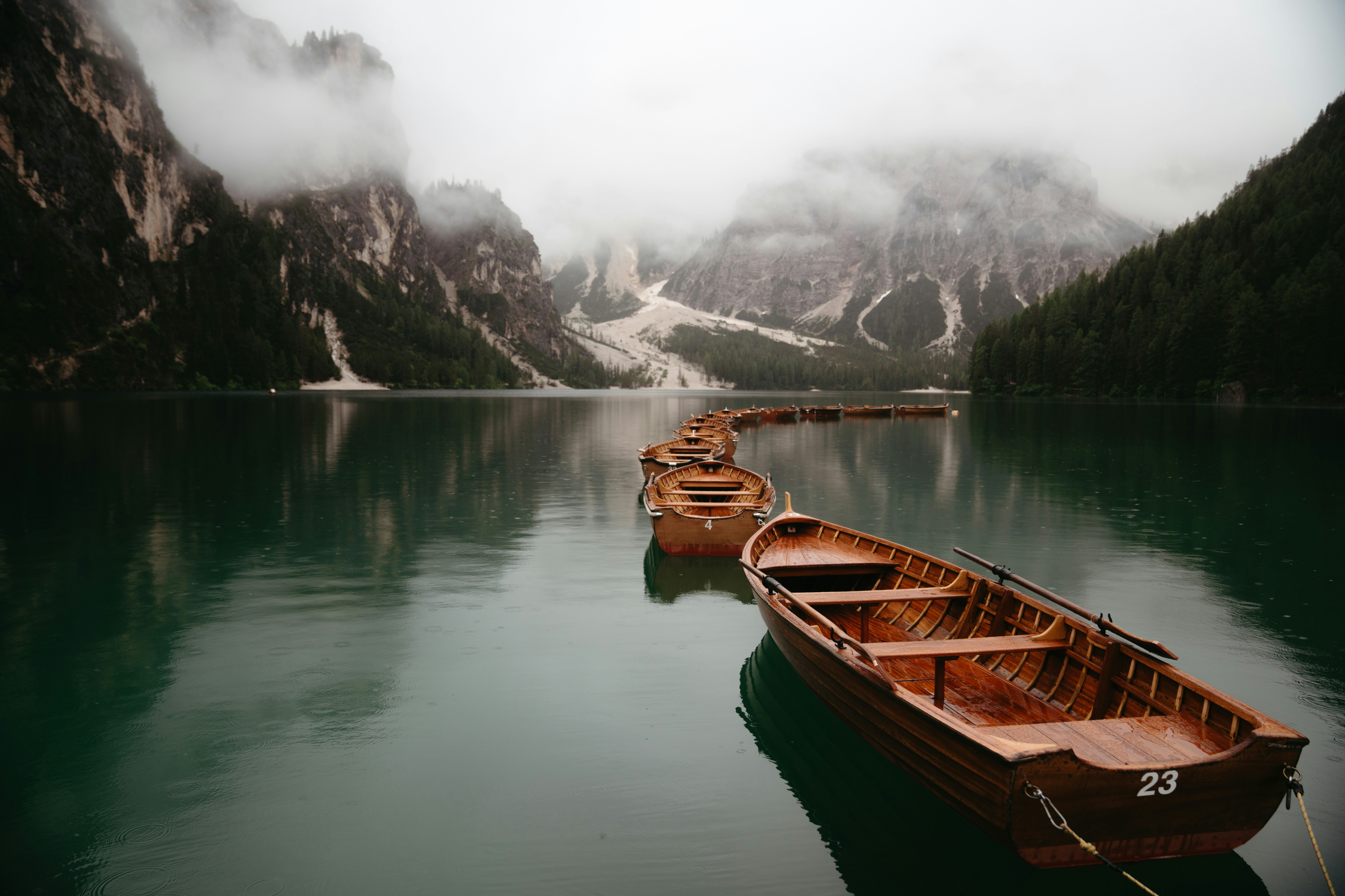 Boats on a misty mountain lake HD Wallpaper