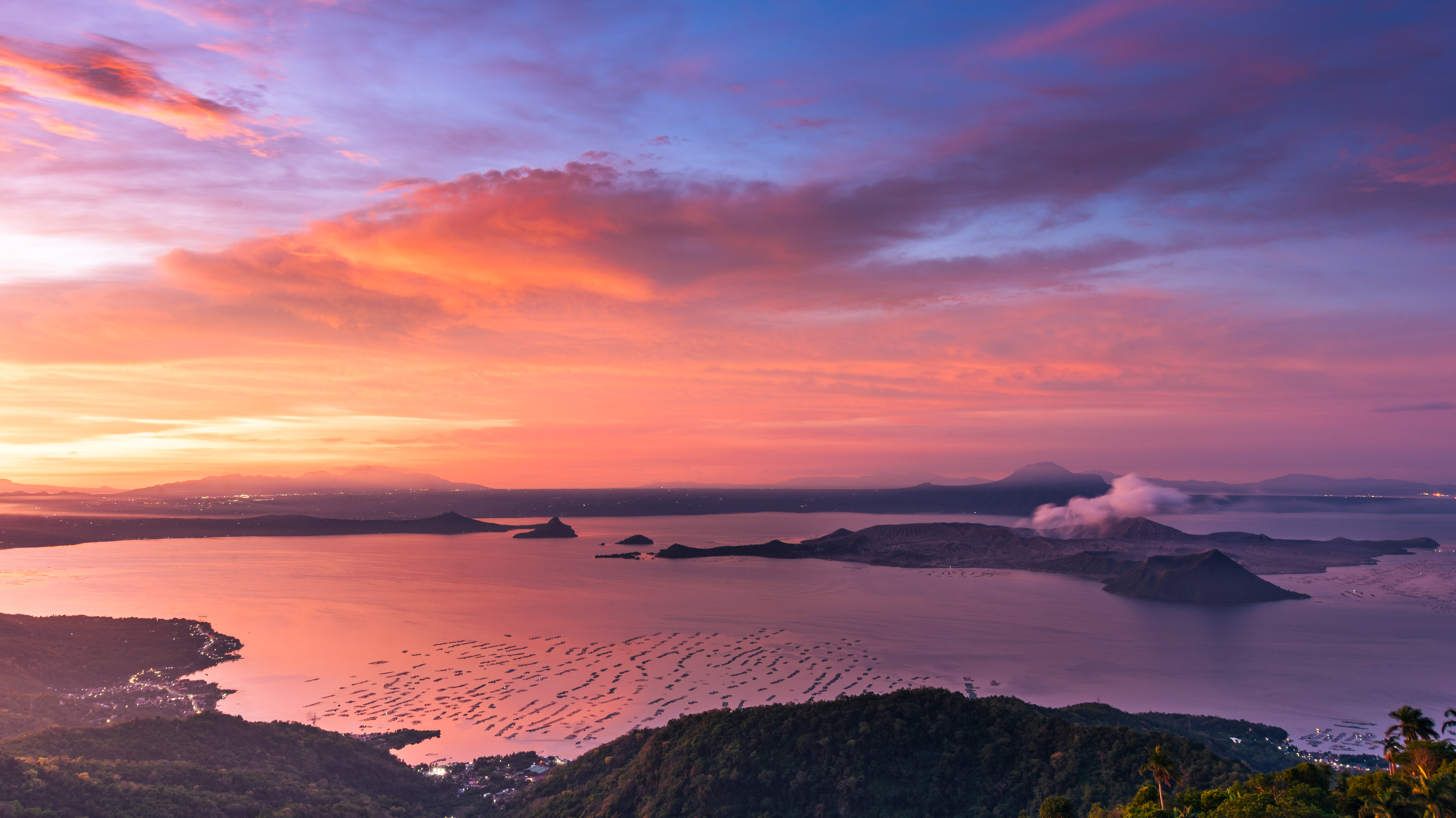 Taal Volcano Island during a vibrant sunset HD Wallpaper