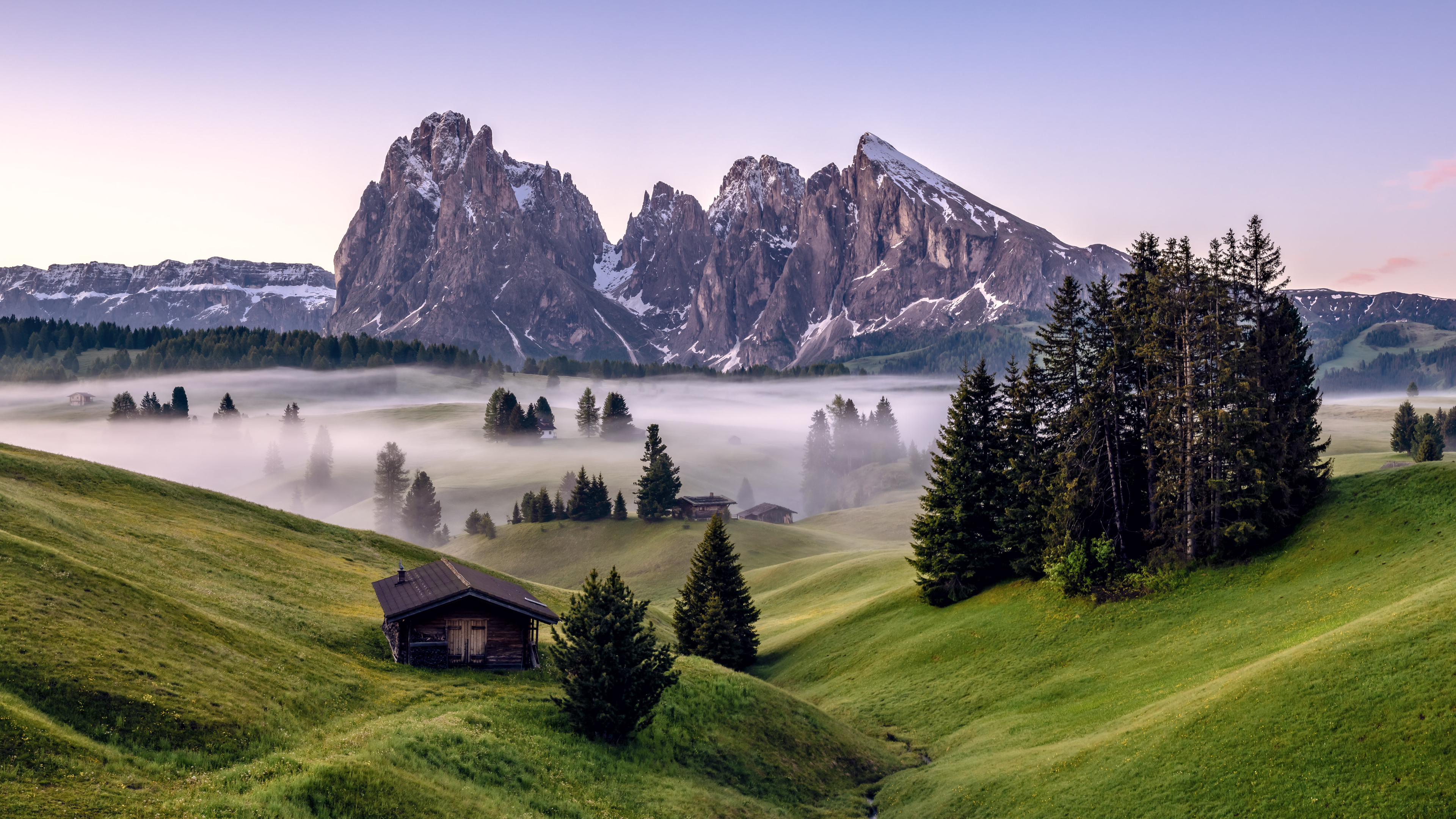 Langkofel mountains with fog and houses in Italy HD Wallpaper