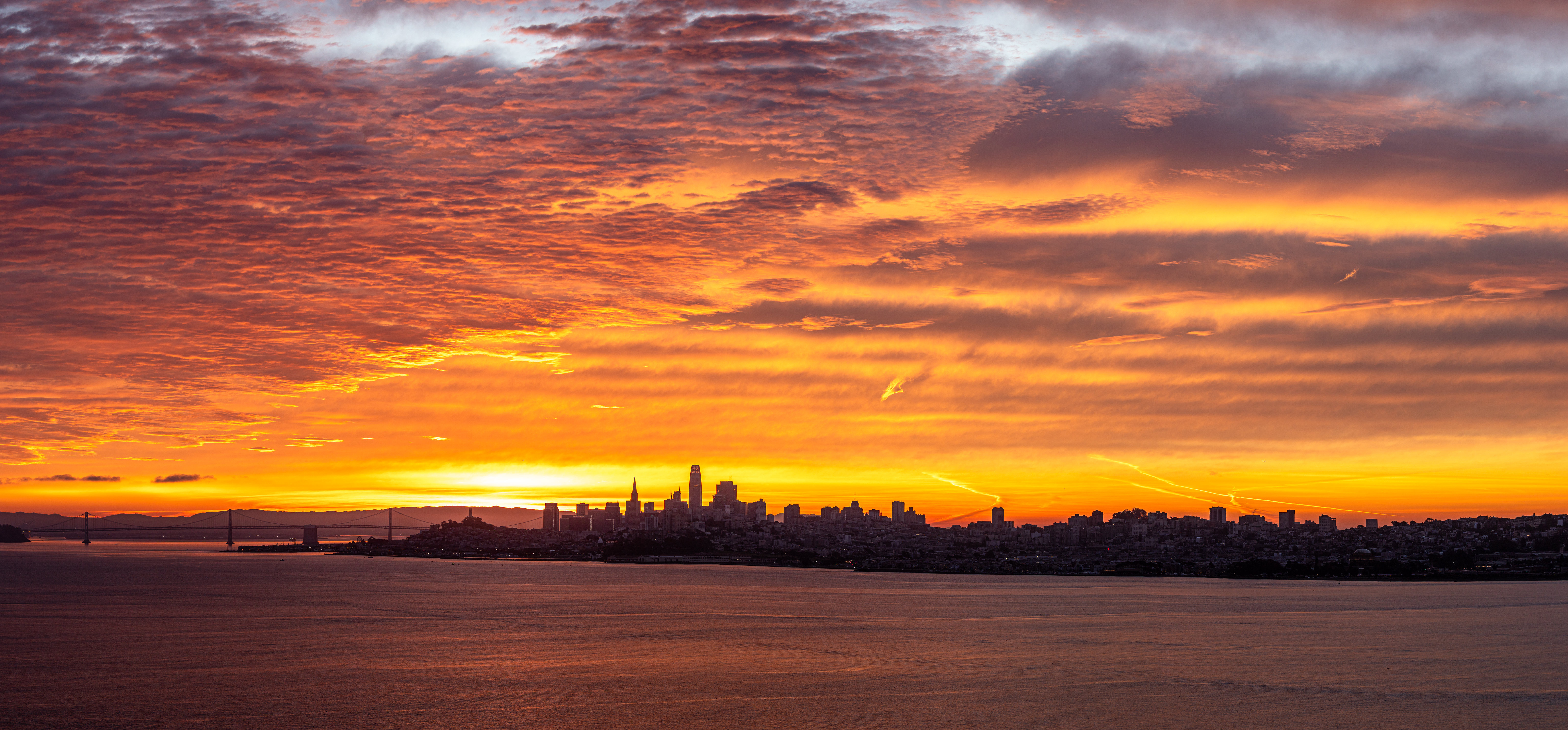 San Francisco cityscape at sunset over the water HD Wallpaper