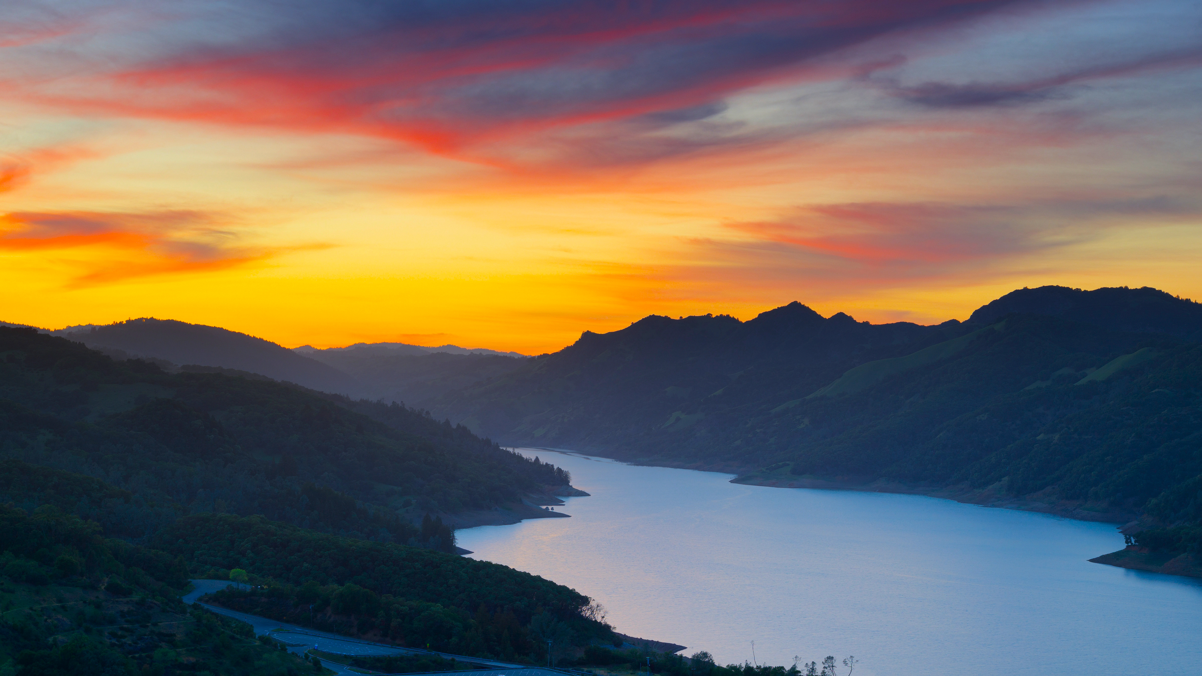 Sunset over a mountain lake with colorful sky HD Wallpaper