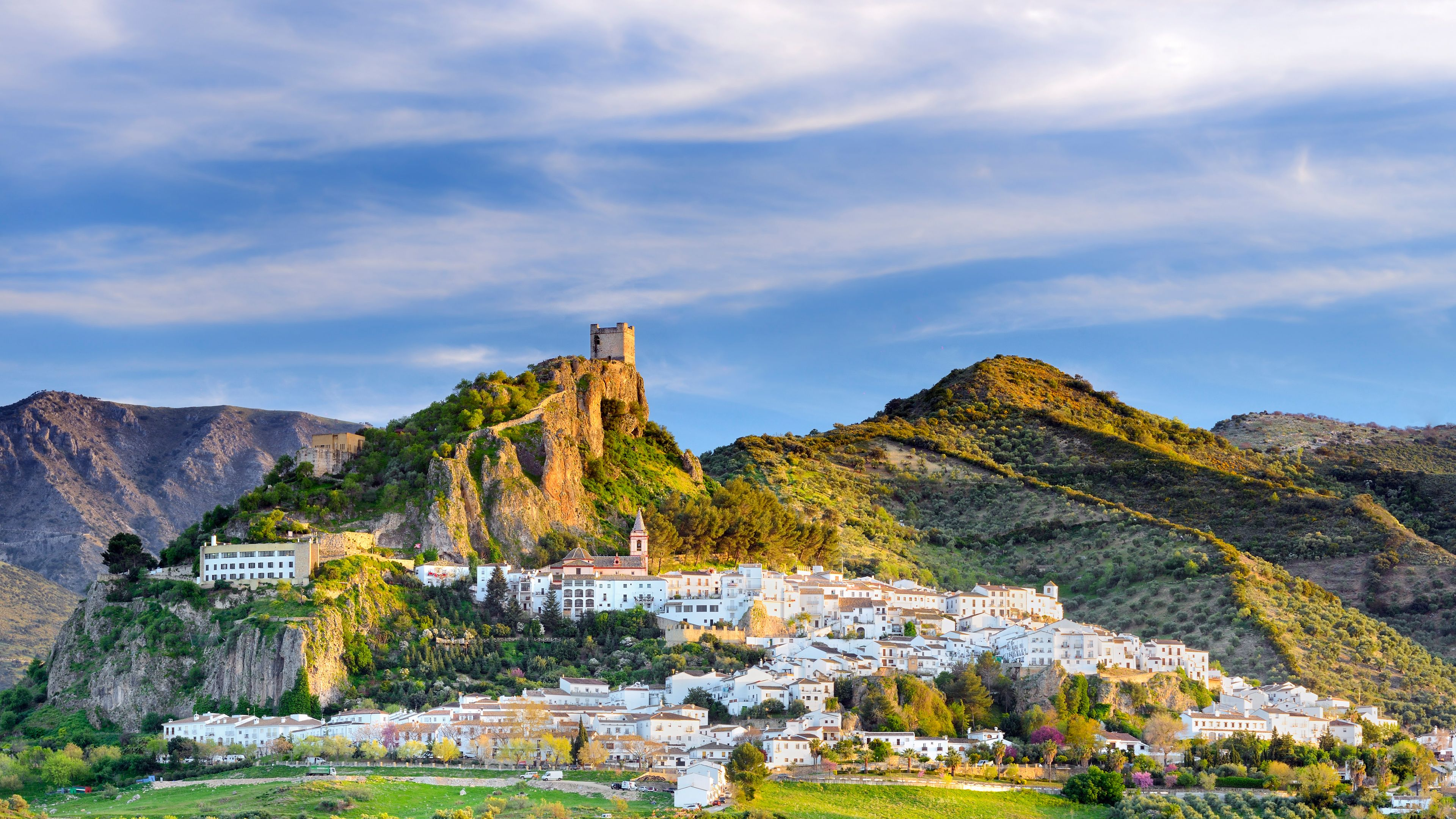 White village with castle on a rocky outcrop in Andalusia HD Wallpaper