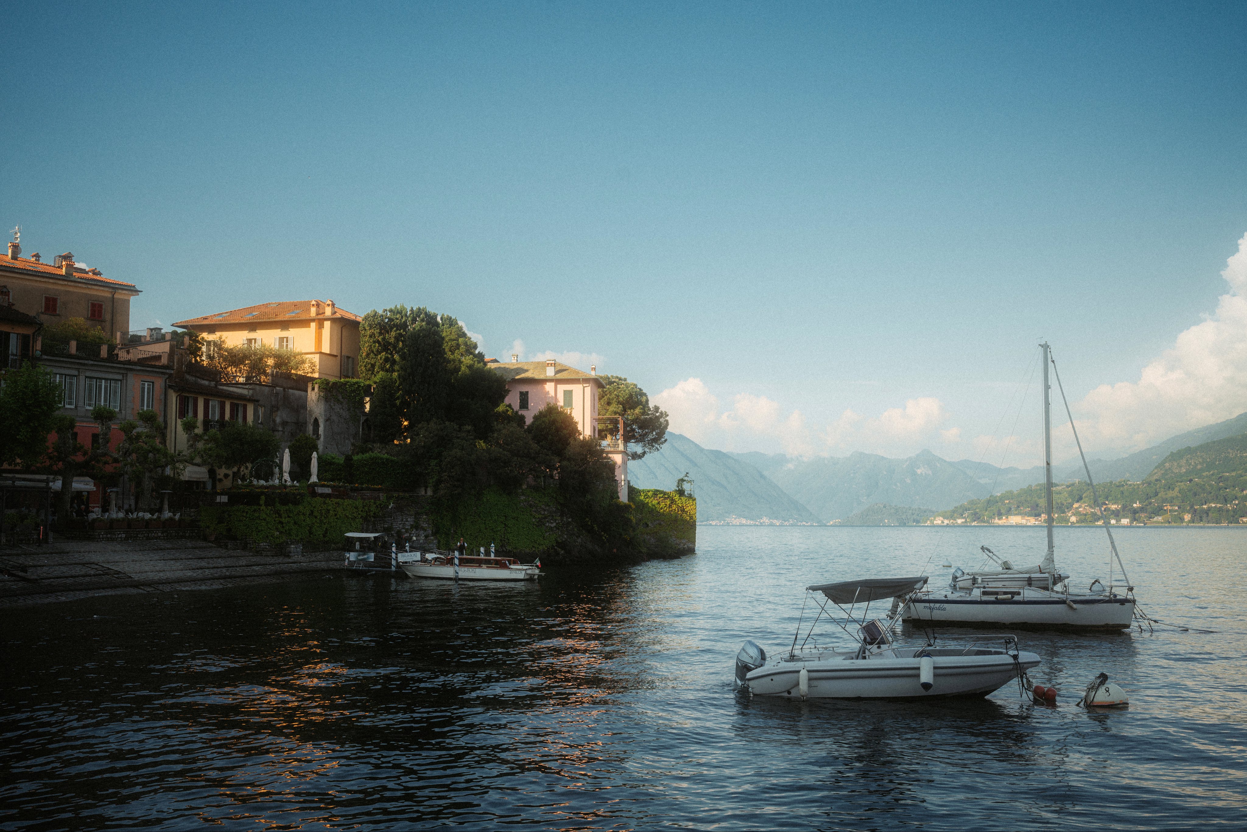 Boats on Lake Como with Mountains in the Background HD Wallpaper