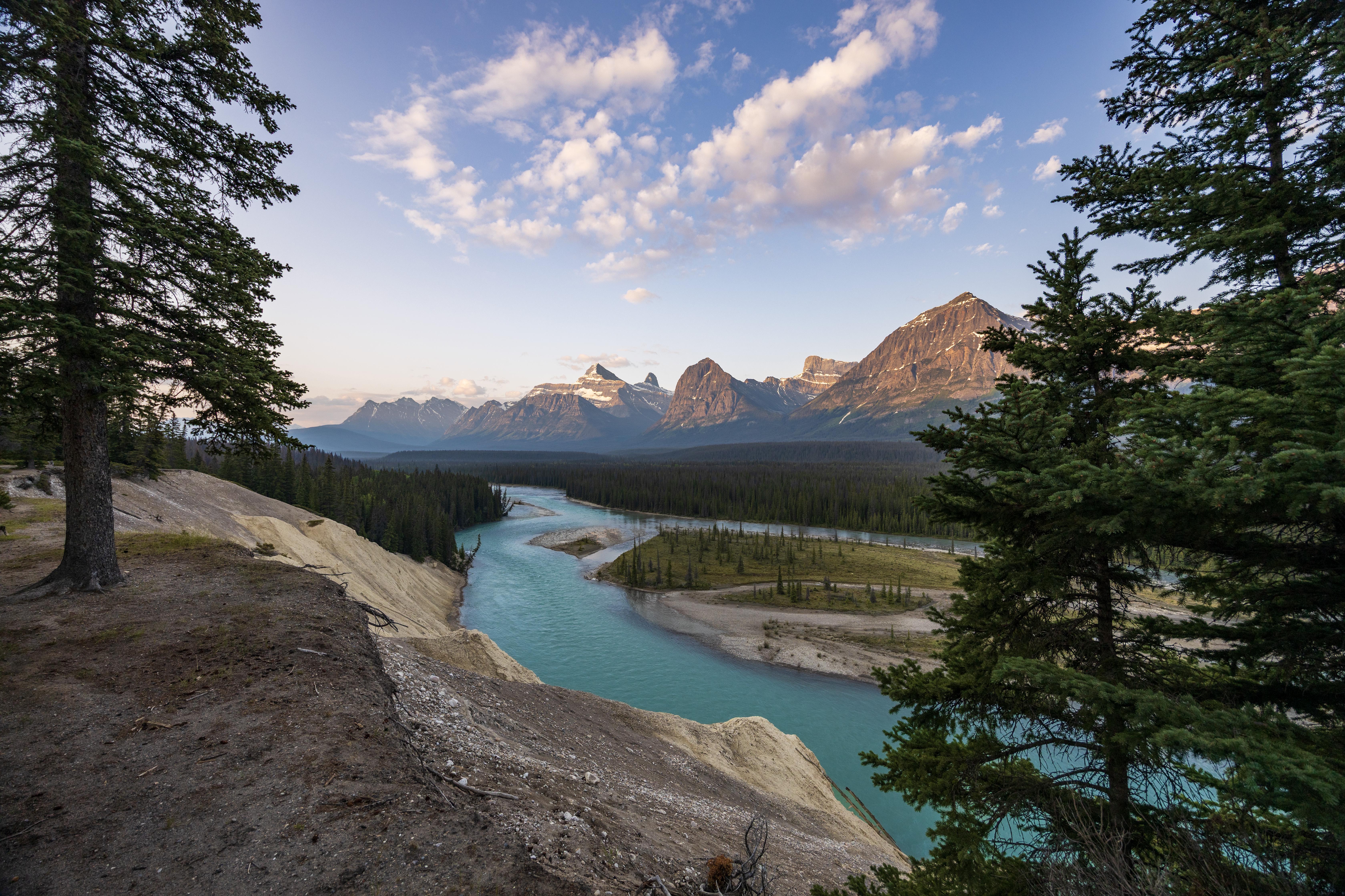 Turquoise River Flows Through Mountains and Forest in Canada HD Wallpaper