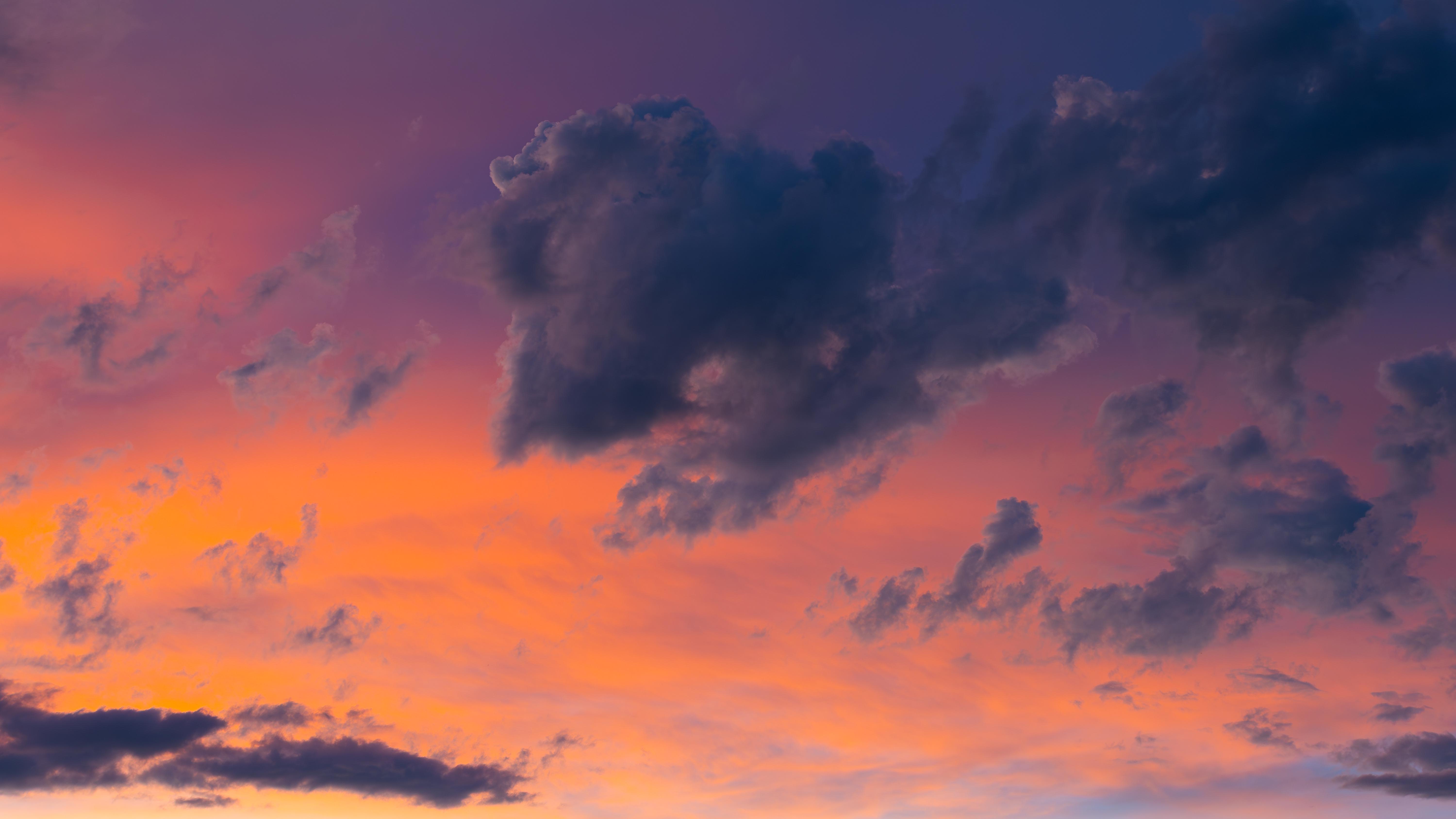 Sunset Clouds Over Orange and Purple Sky HD Wallpaper