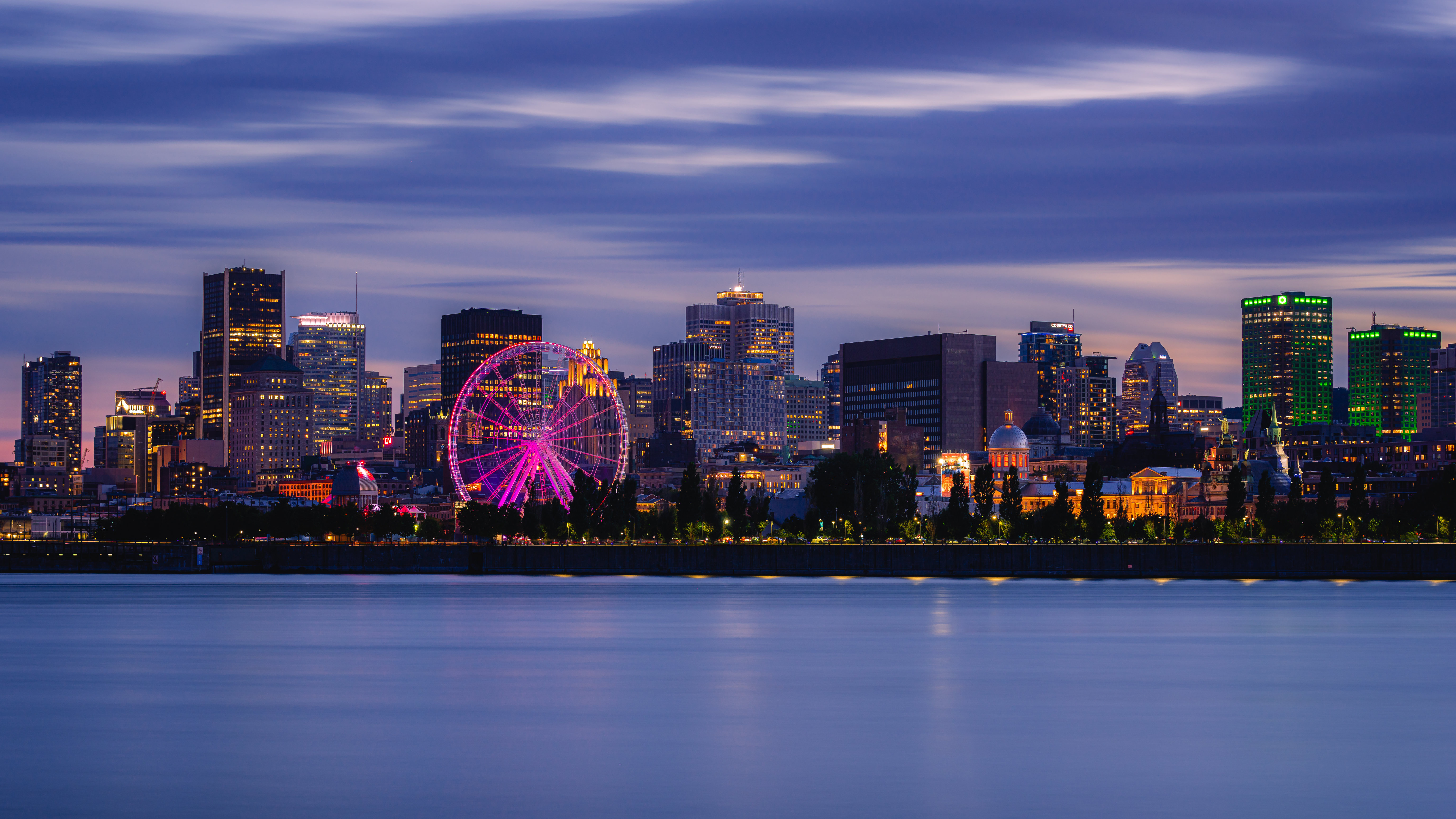 Montreal skyline at dusk with a Ferris wheel HD Wallpaper
