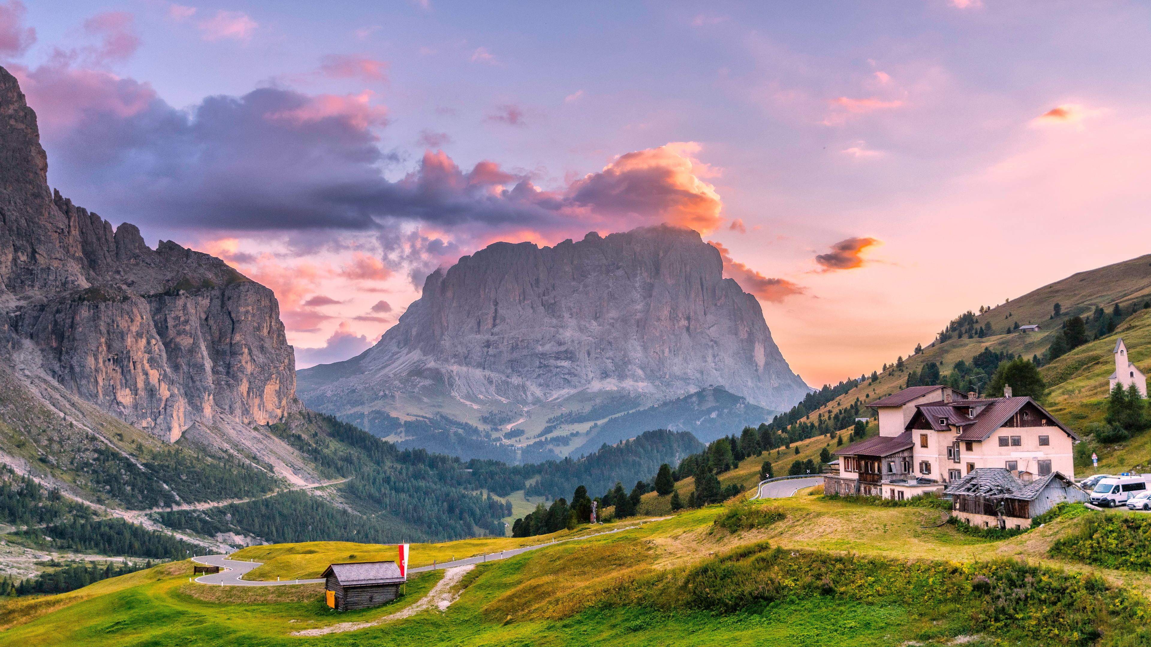 Mountain landscape with a building and a small cabin HD Wallpaper