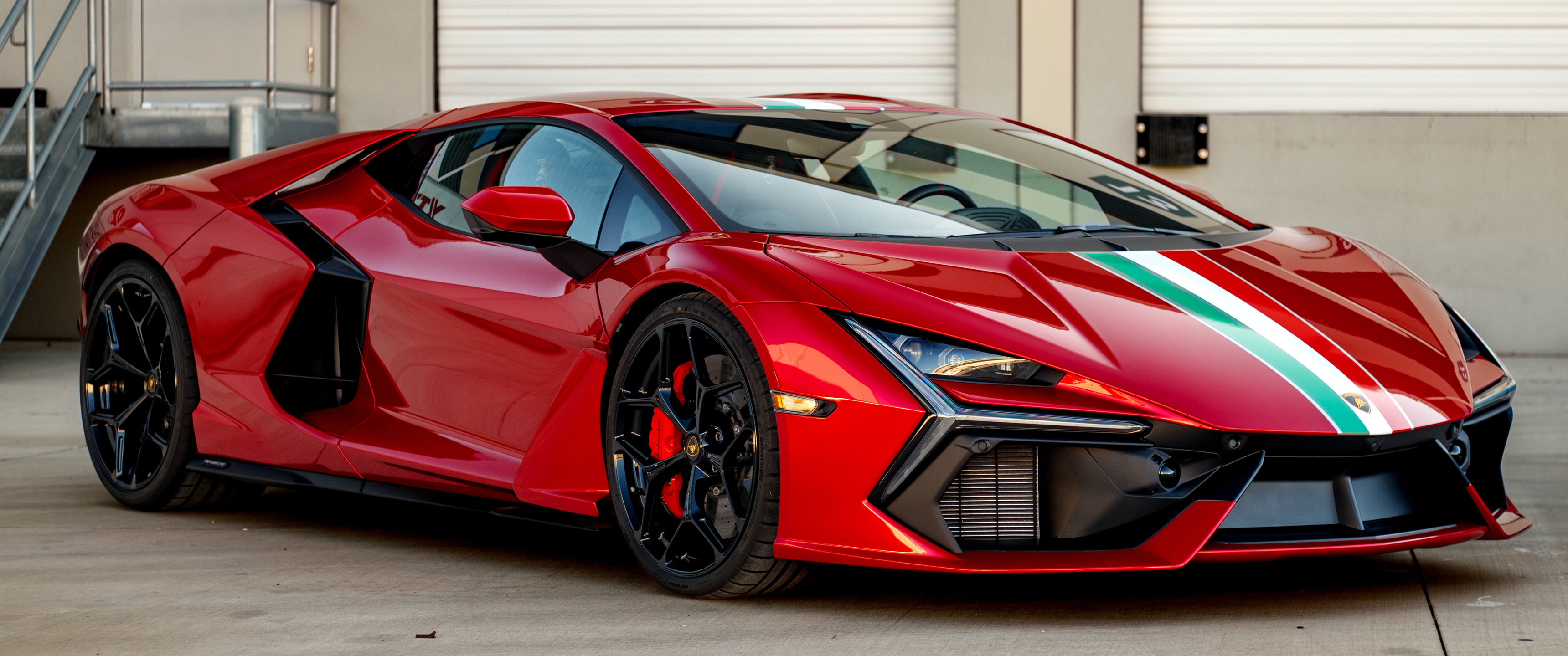 Lamborghini Revuelto in red with Italian flag stripe HD Wallpaper