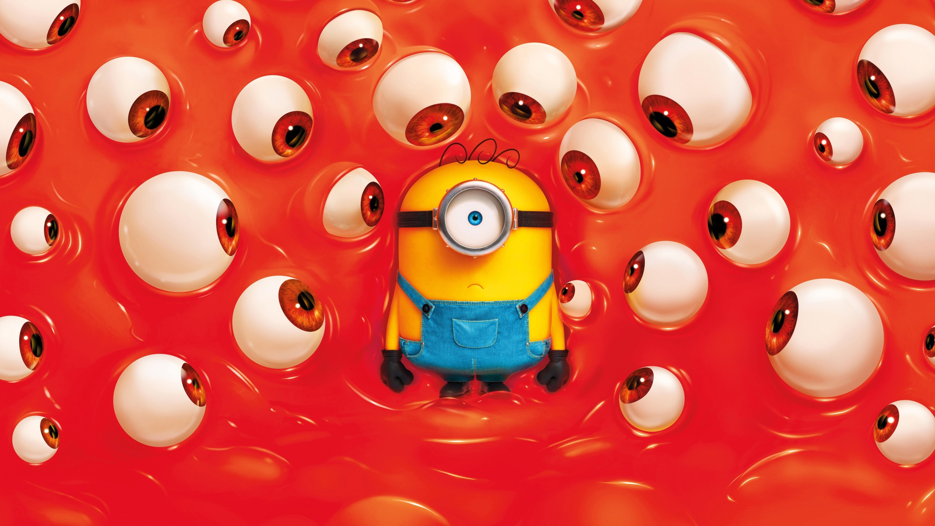 Stuart the Minion surrounded by eyeballs in Minions & Monsters HD Wallpaper