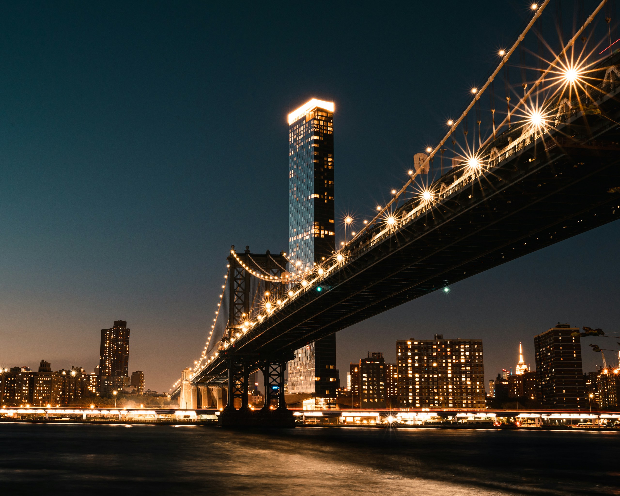 Manhattan Bridge and New York City Skyline at Night HD Wallpaper