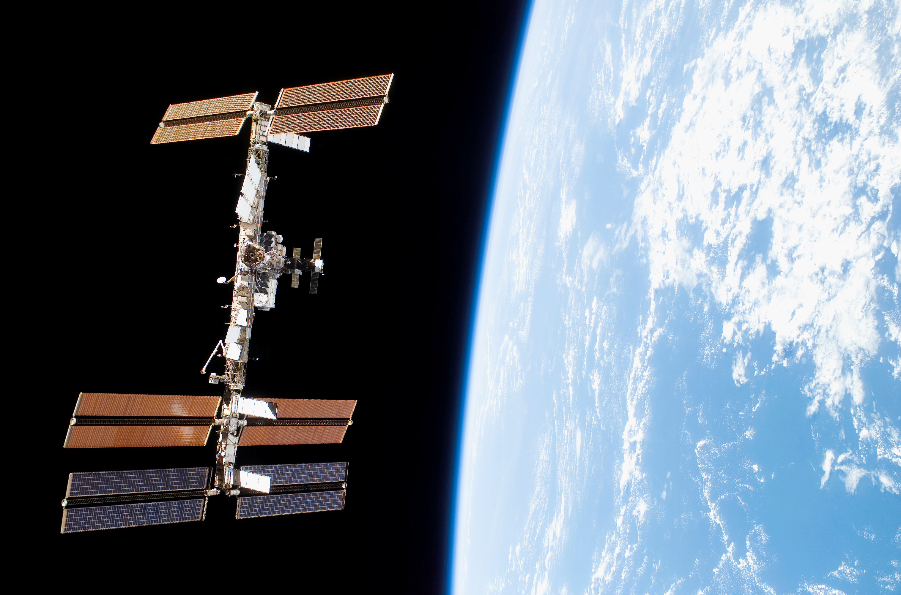 International Space Station Orbiting Above Earth HD Wallpaper